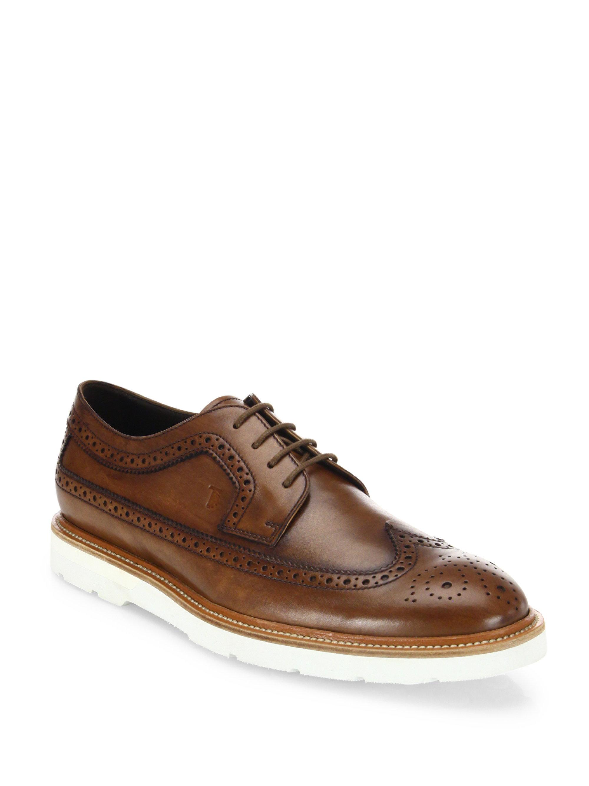 tods oxford shoes tod s wingtip perforated leather oxford shoes in brown for tods oxford shoes tod s wingtip perforated leather oxford shoes in brown for