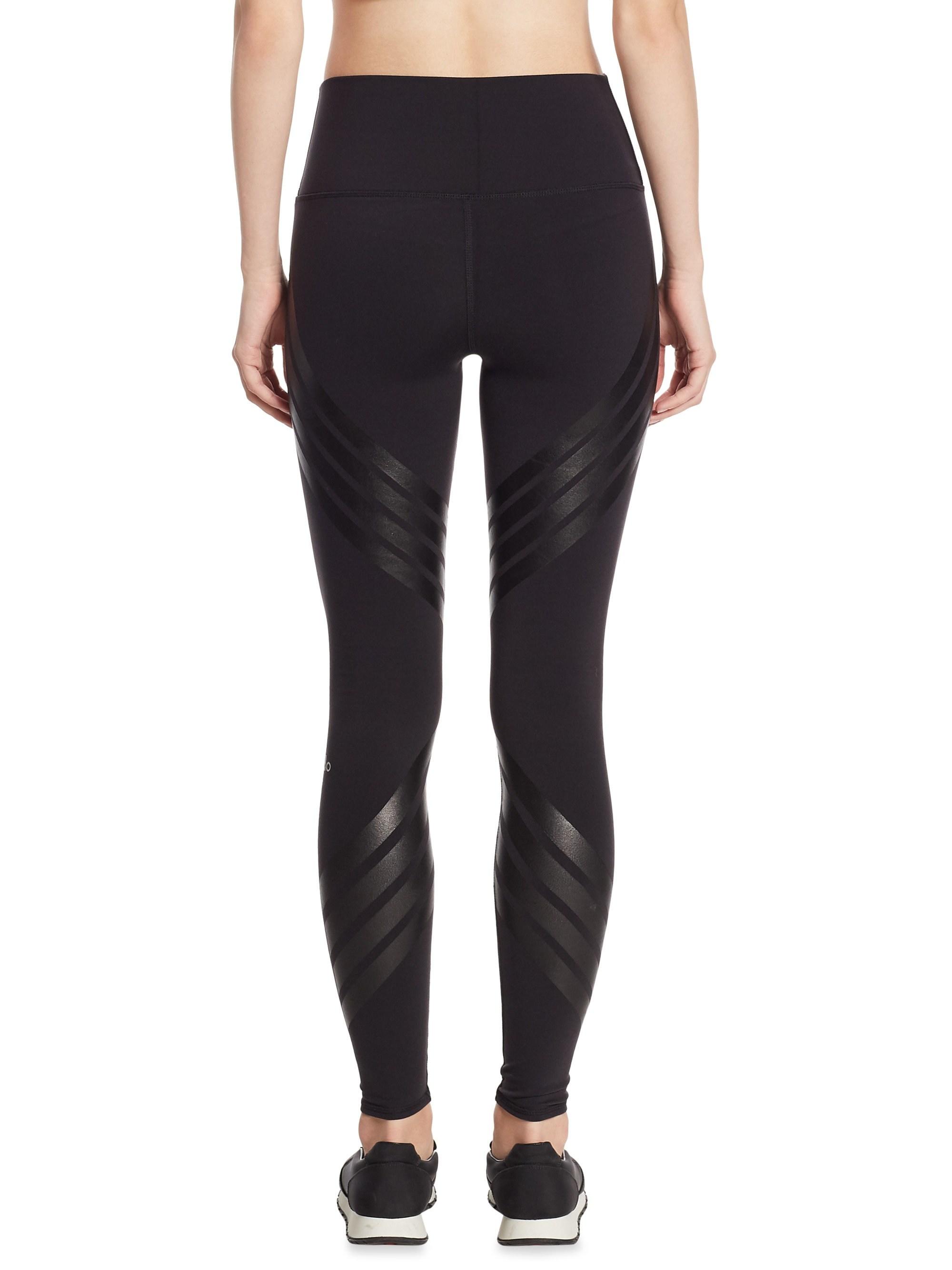 https://cdna.lystit.com/photos/saksfifthavenue/0c7e94c4/alo-yoga-black-Womens-Striped-Airbrush-Leggings-Black-Size-Medium.jpeg