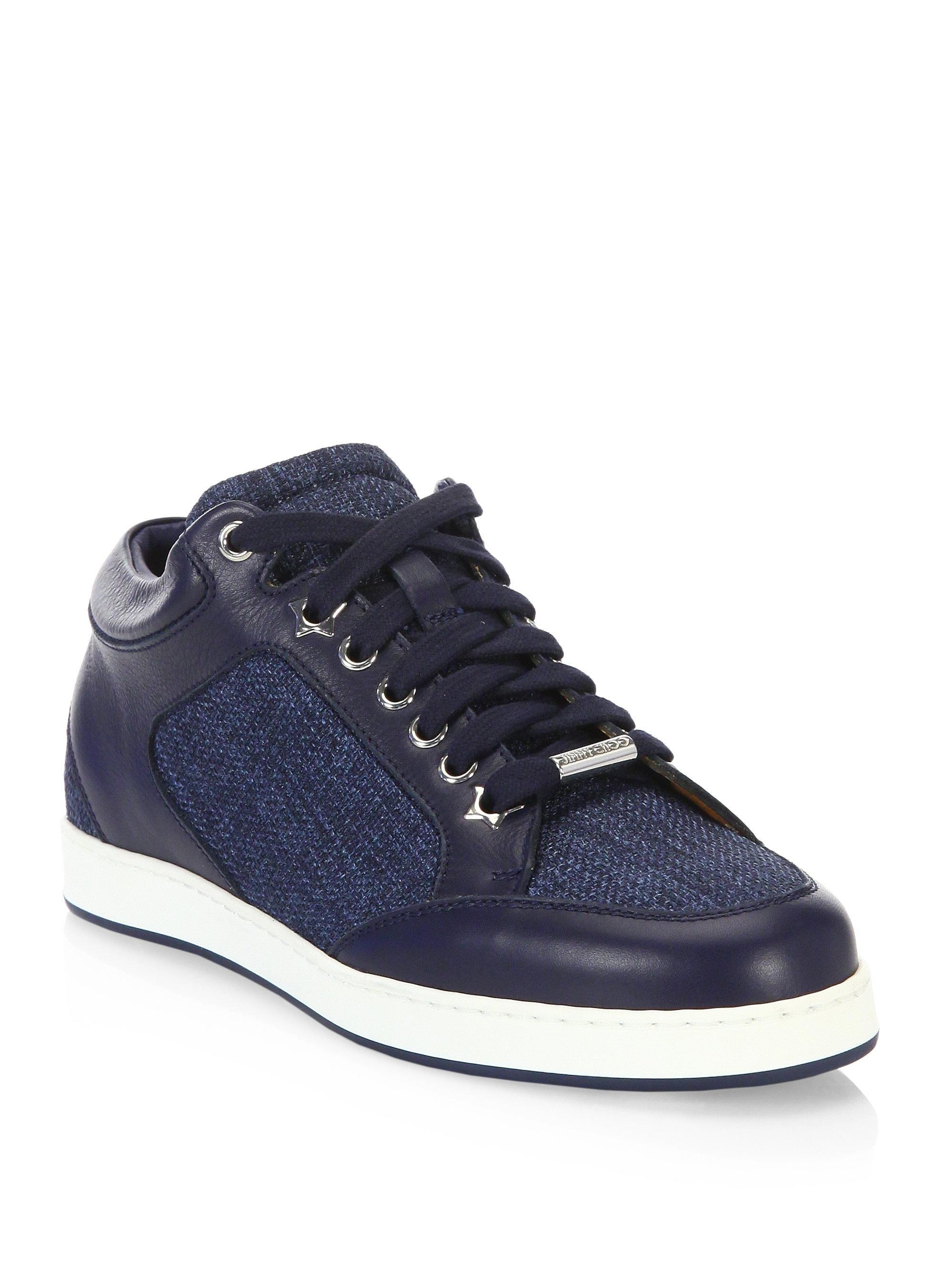 navy jimmy choo trainers