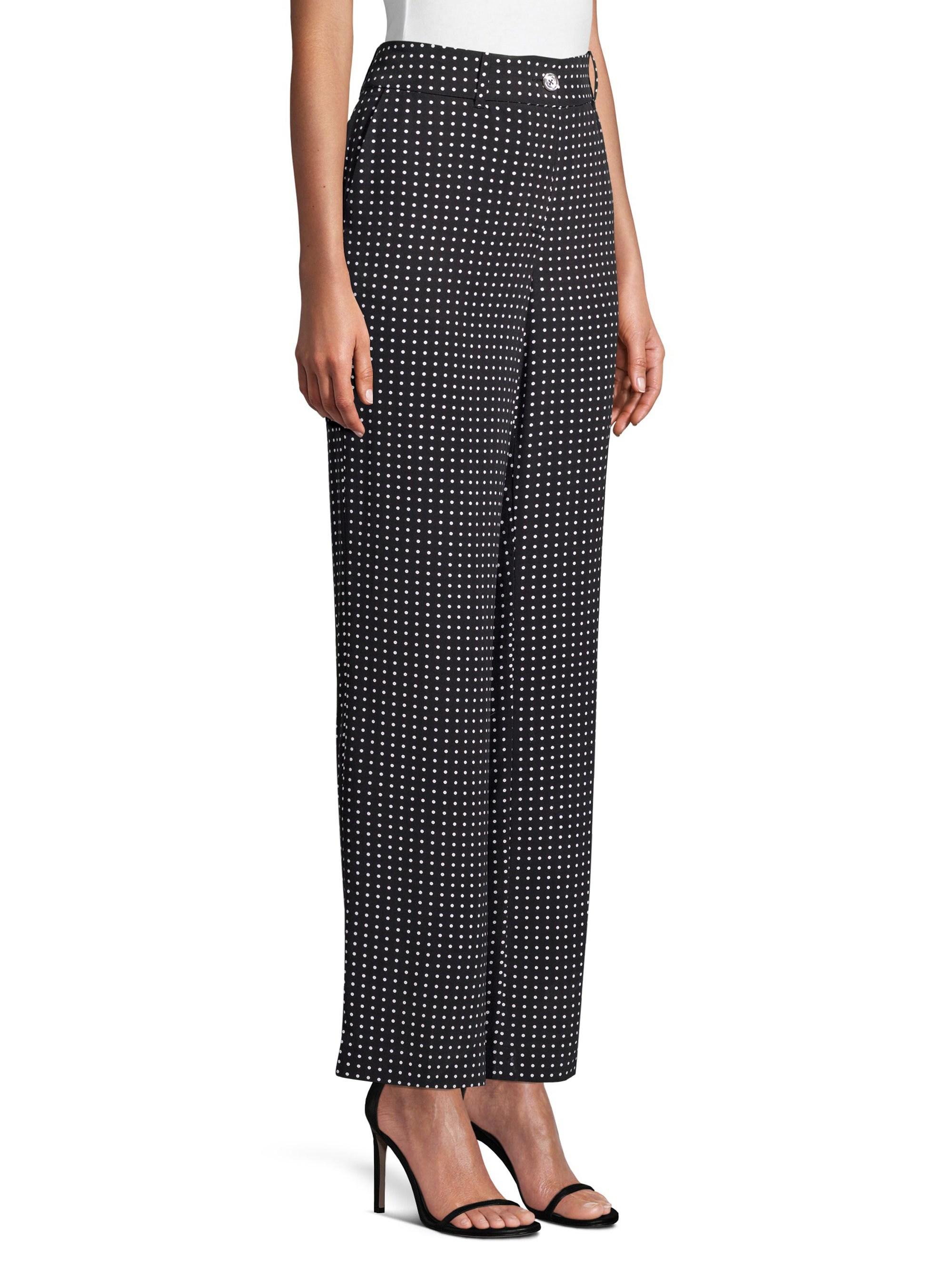 white polka dot trousers