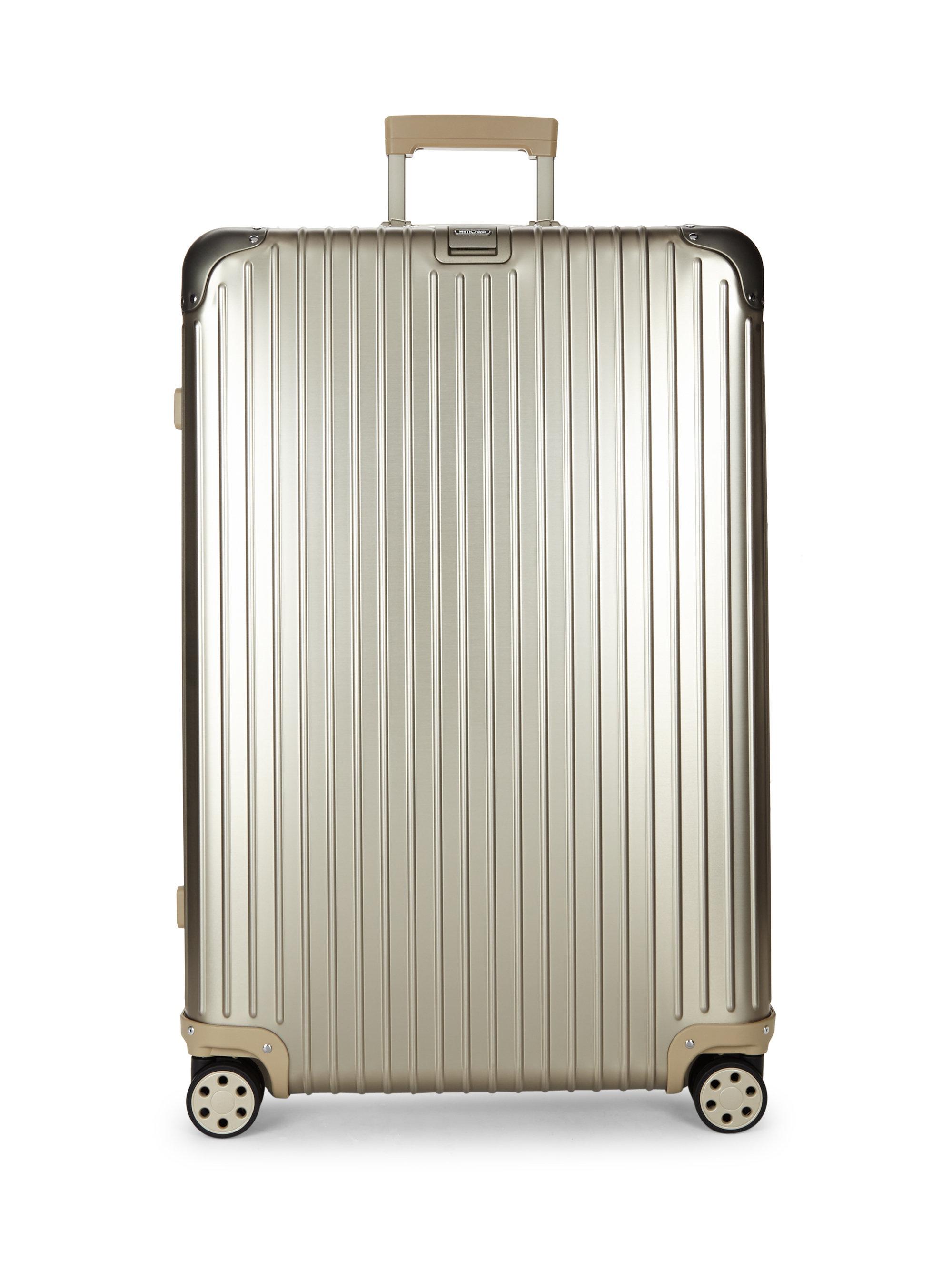 rimowa gold suitcase