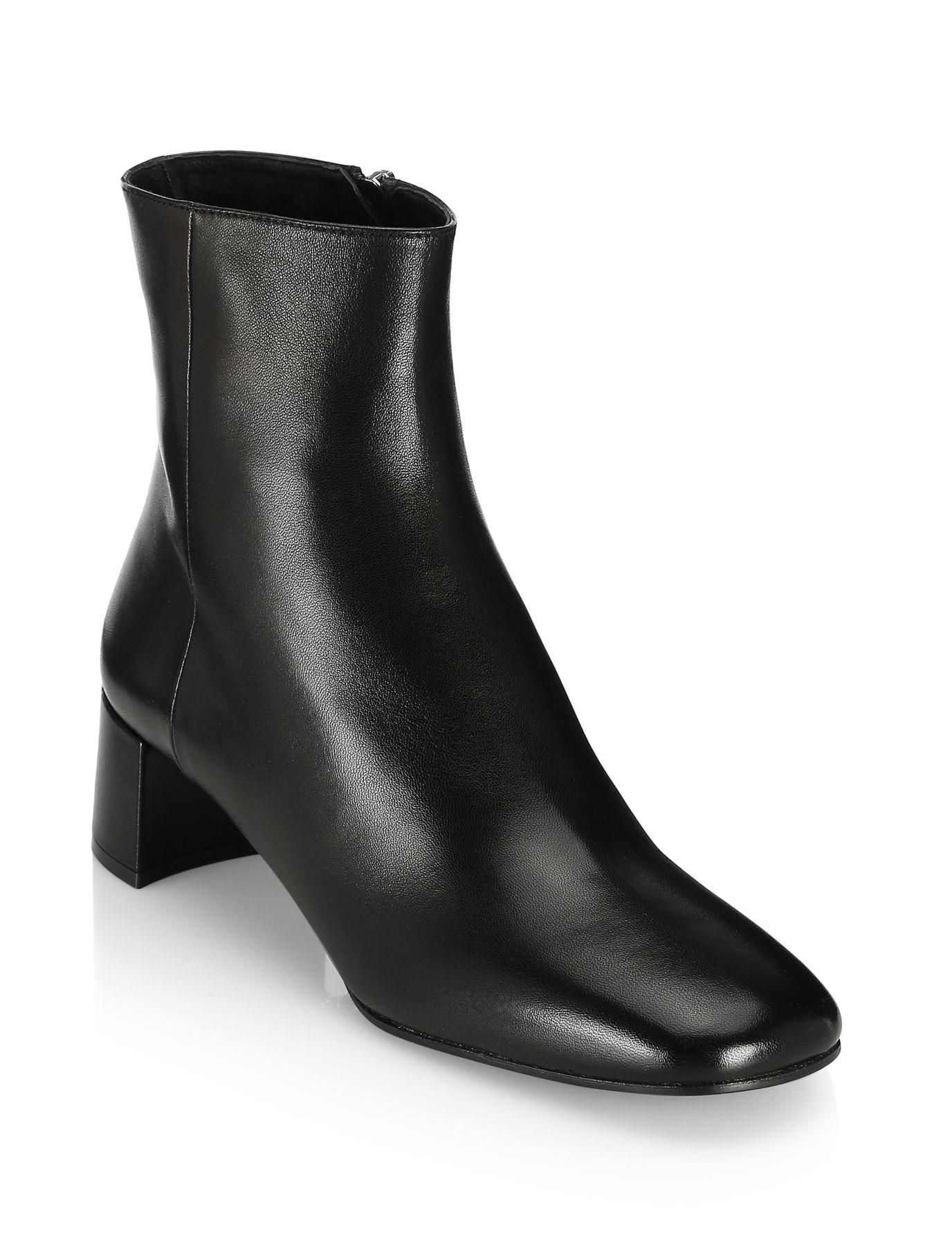 Prada Triangle Logo Leather Ankle Boots in Black | Lyst