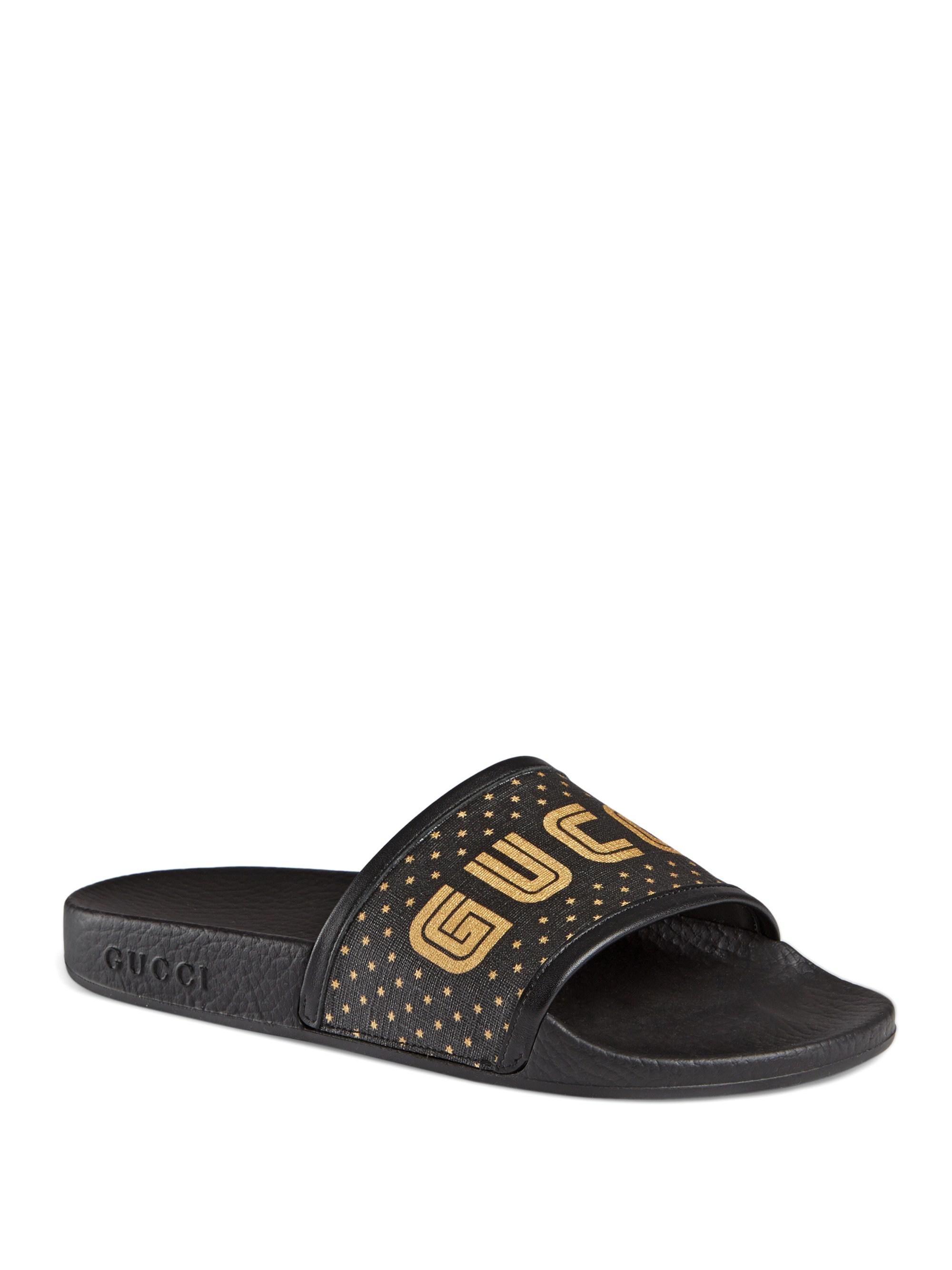 black and gold gucci slides