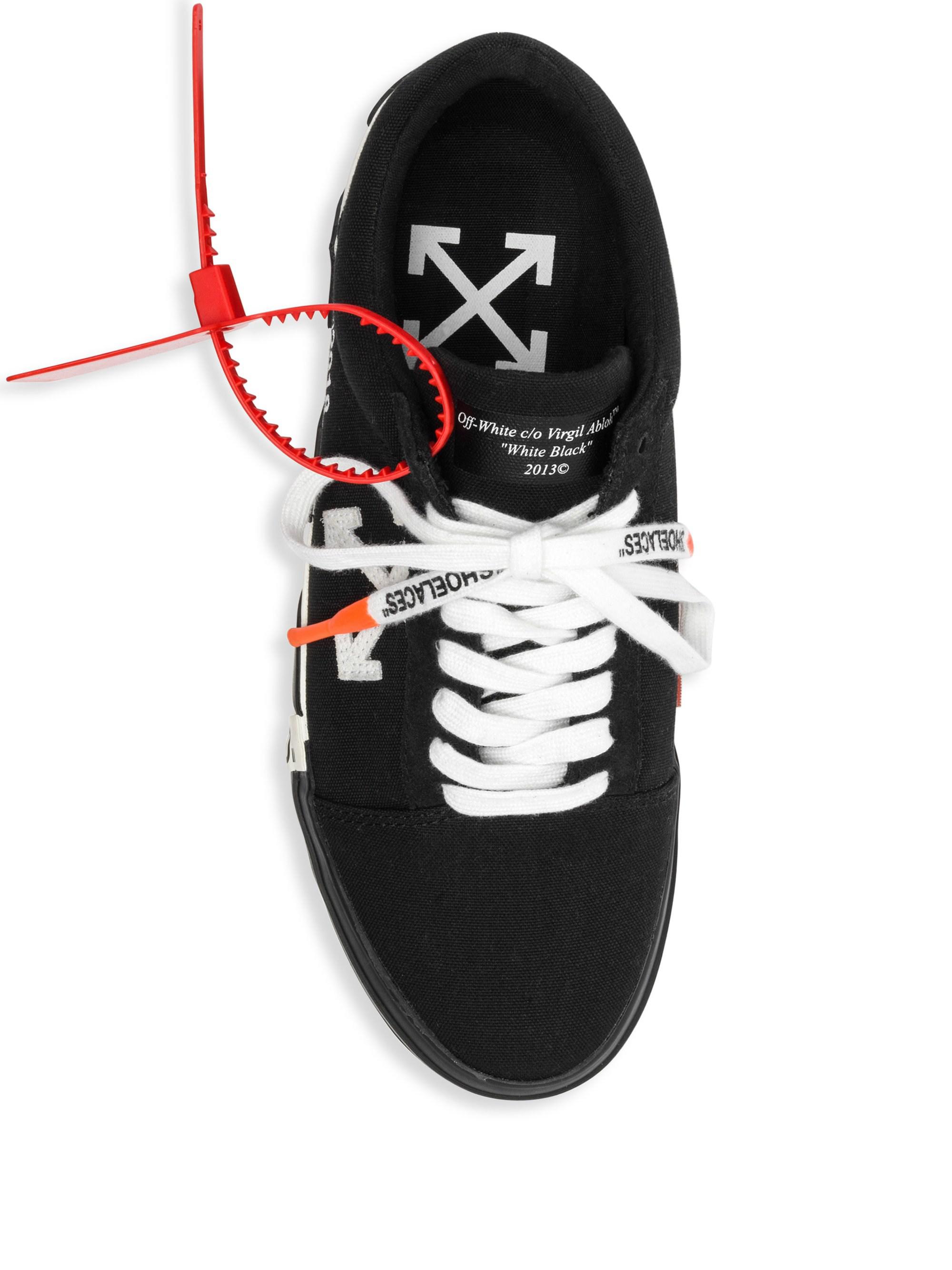 vulcanised striped low top sneakers