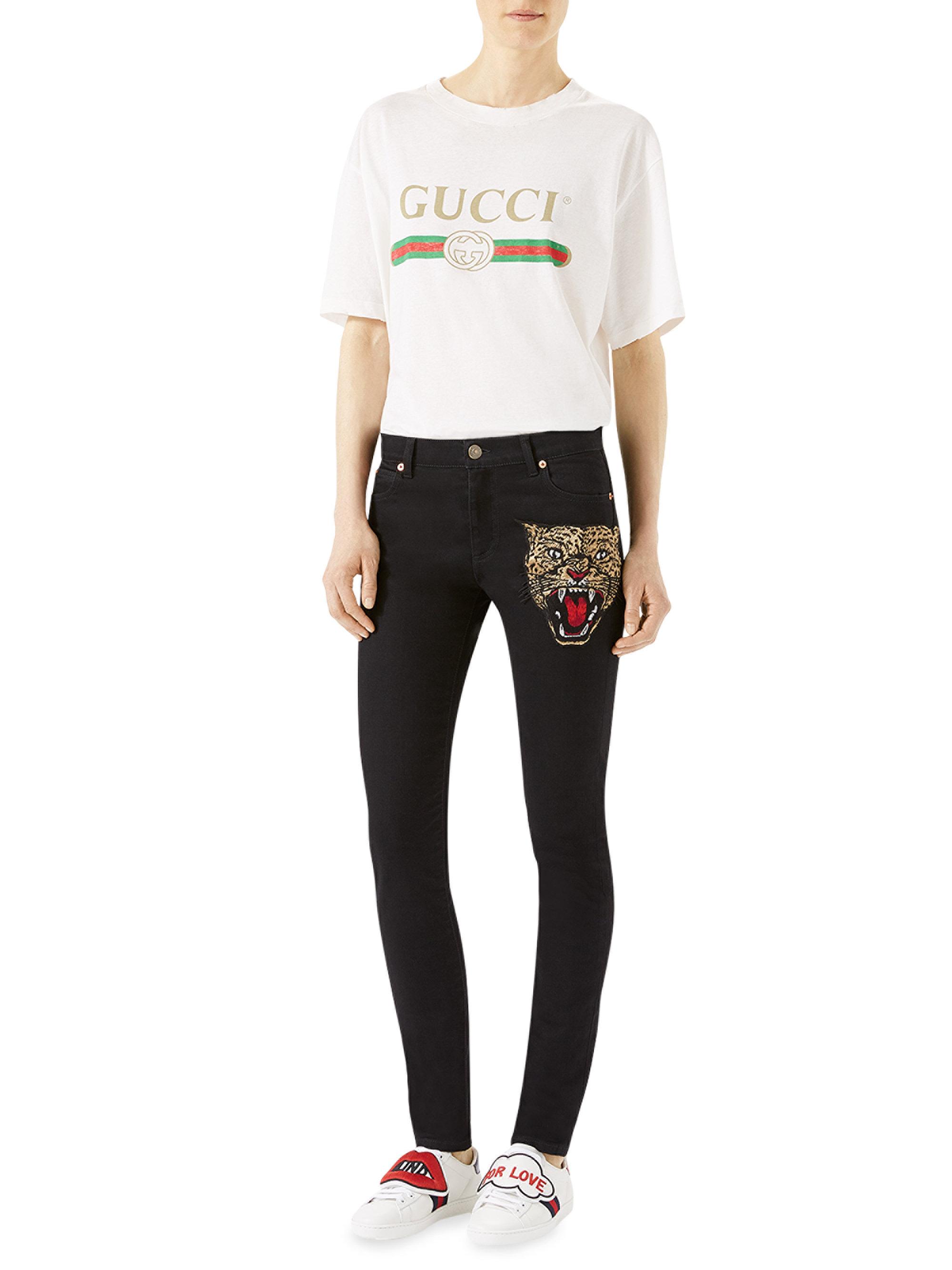 gucci cat jeans