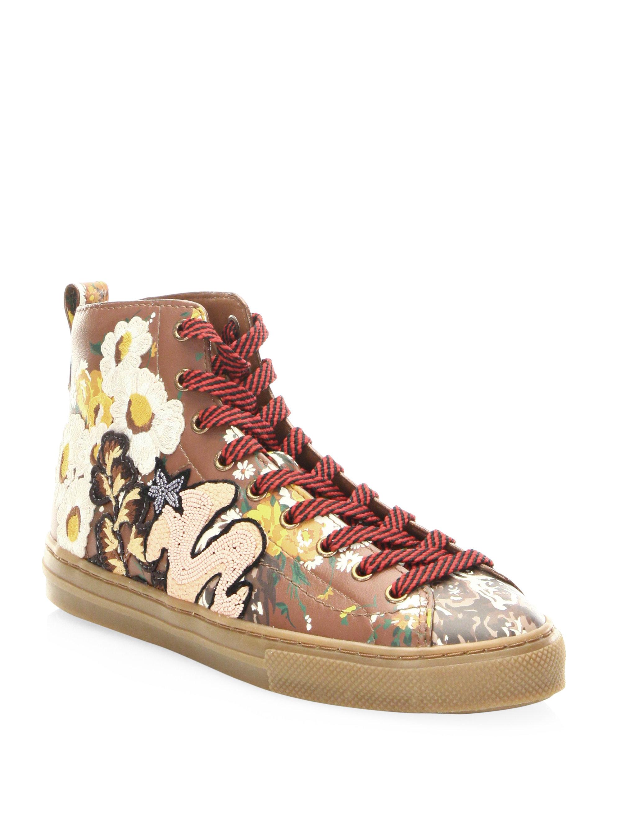 coach flower sneakers