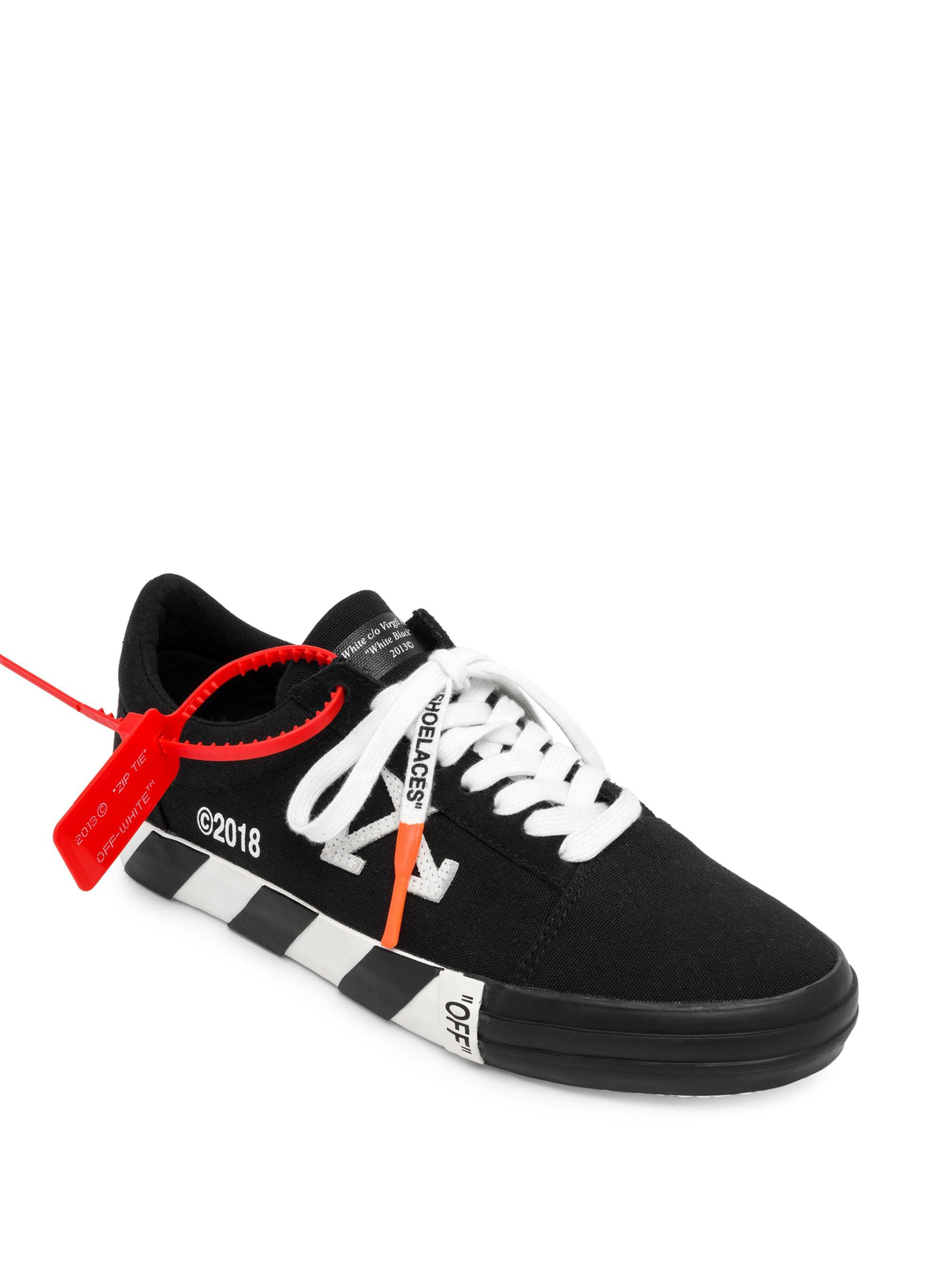 vulcanised striped low top sneakers