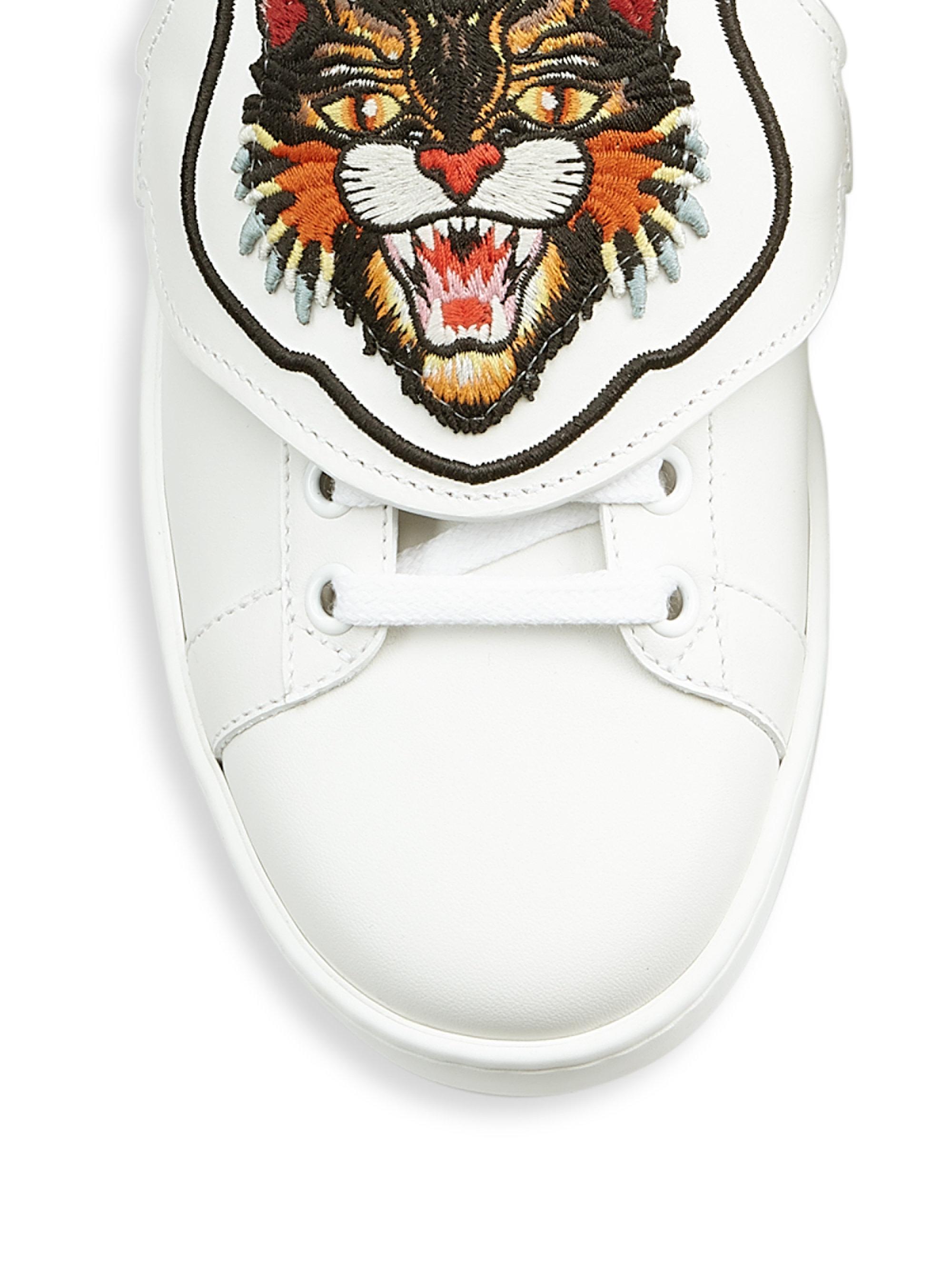 gucci lion sneakers