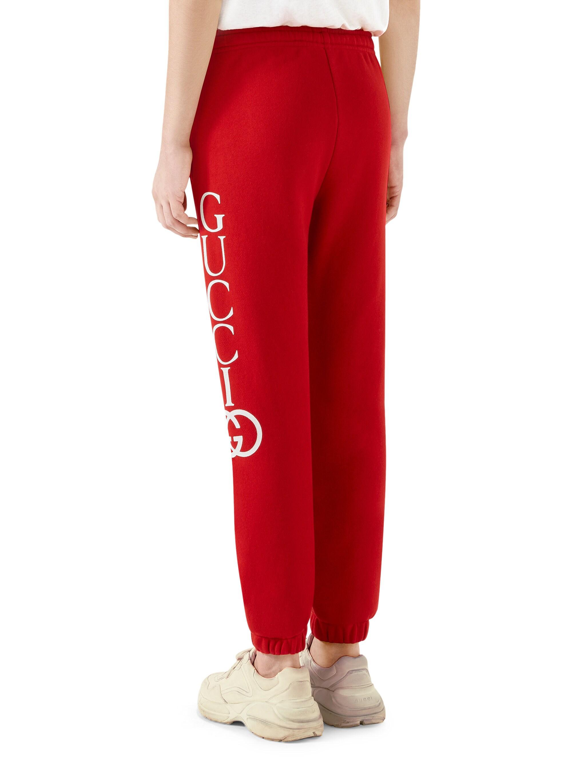 red gucci sweatpants