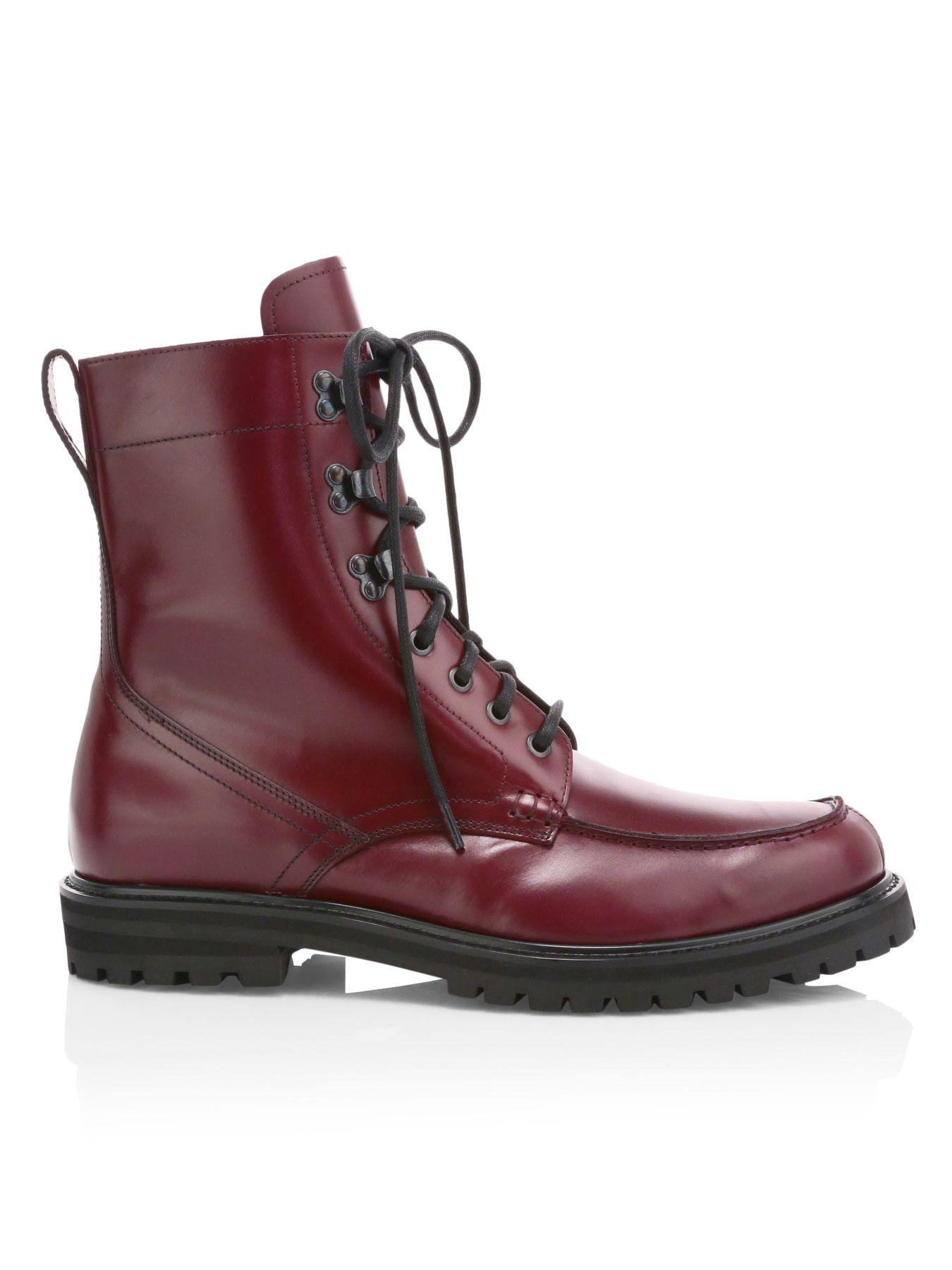 combat boots with red sole