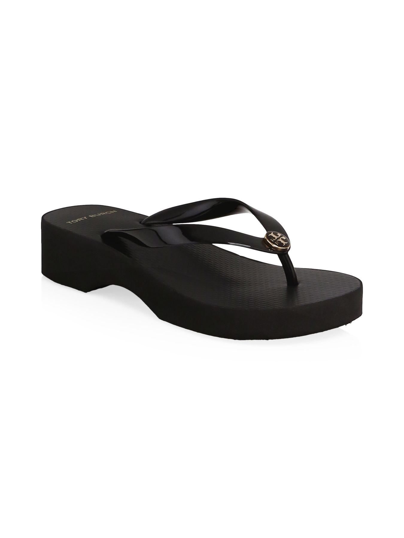 Tory Burch Rubber Cut-out Wedge Logo Flip-flops in Black - Lyst