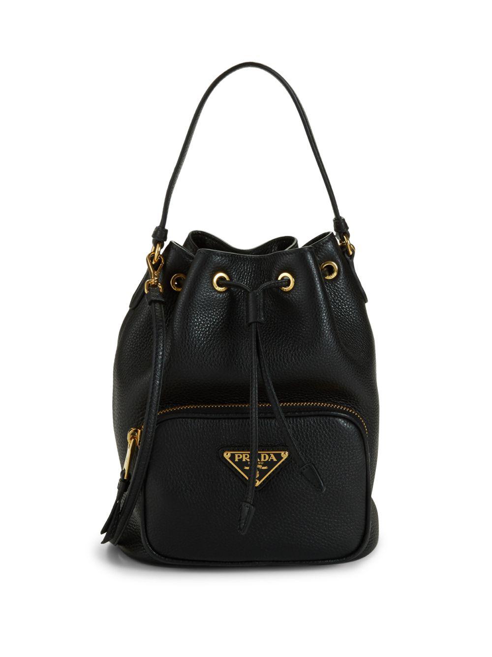 Prada Triangle Logo Leather Bucket Bag in Black - Lyst