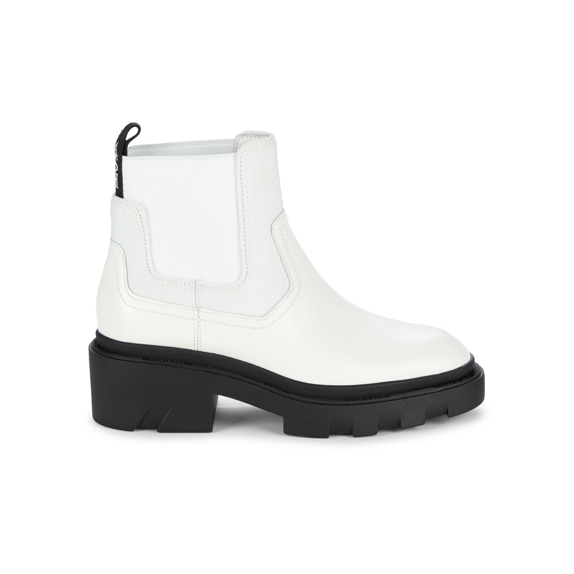 white slip on boots