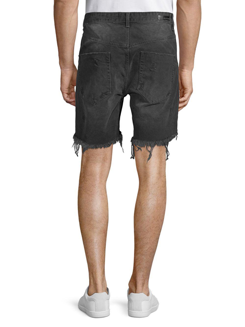 black frayed shorts