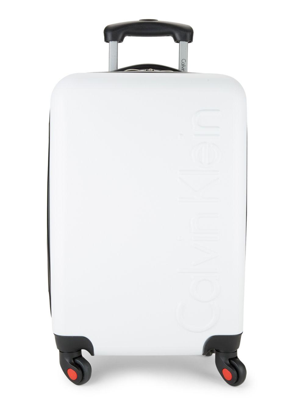 white hard suitcase