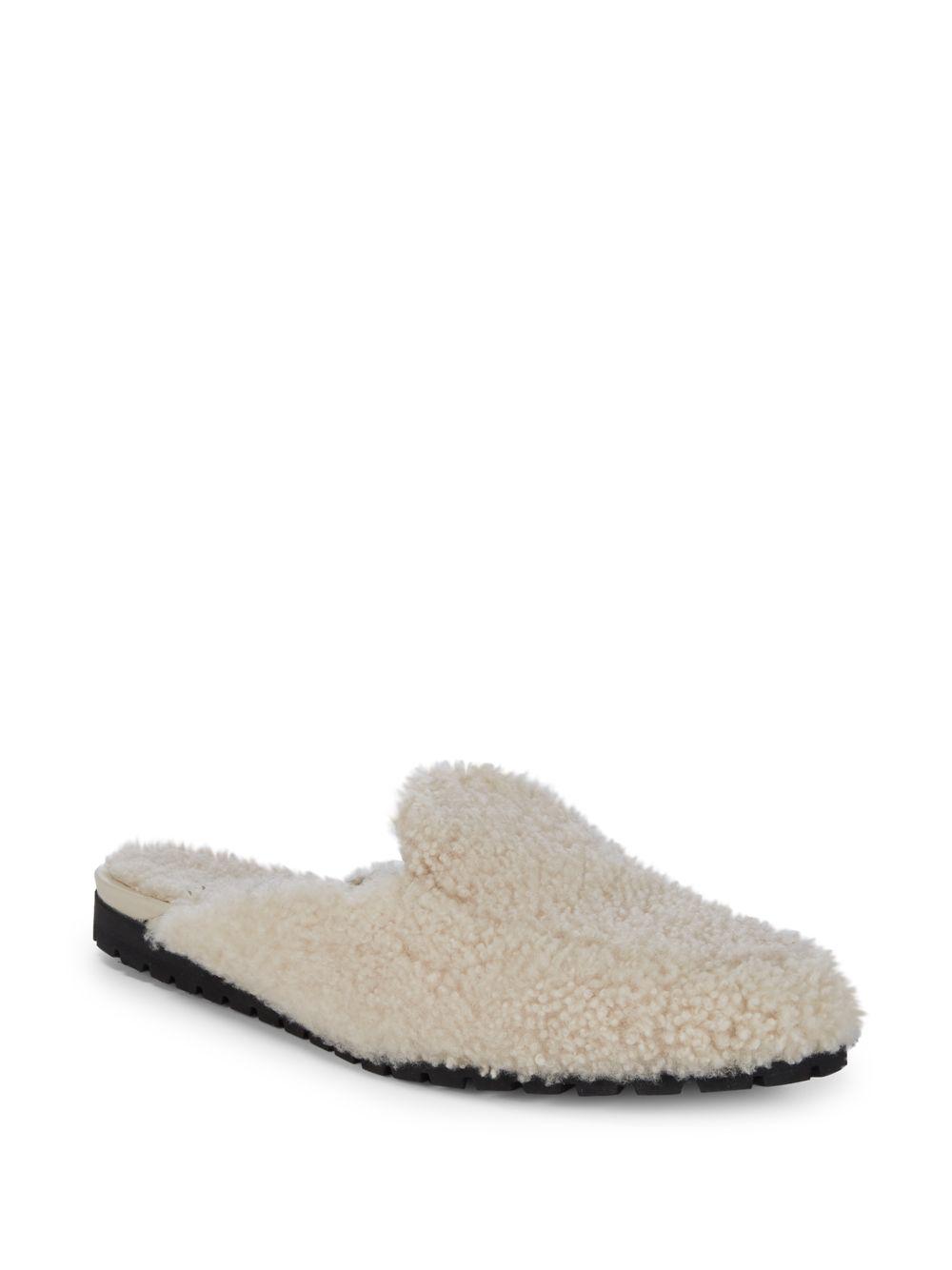 cream backless loafers