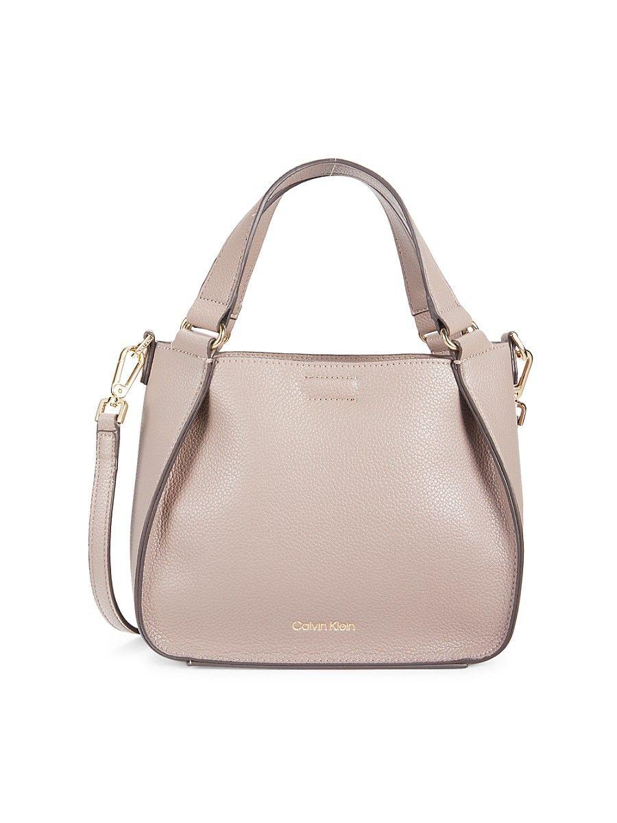 Calvin Klein Re-Lock saddle crossbody handbag – House of Labels Ltd