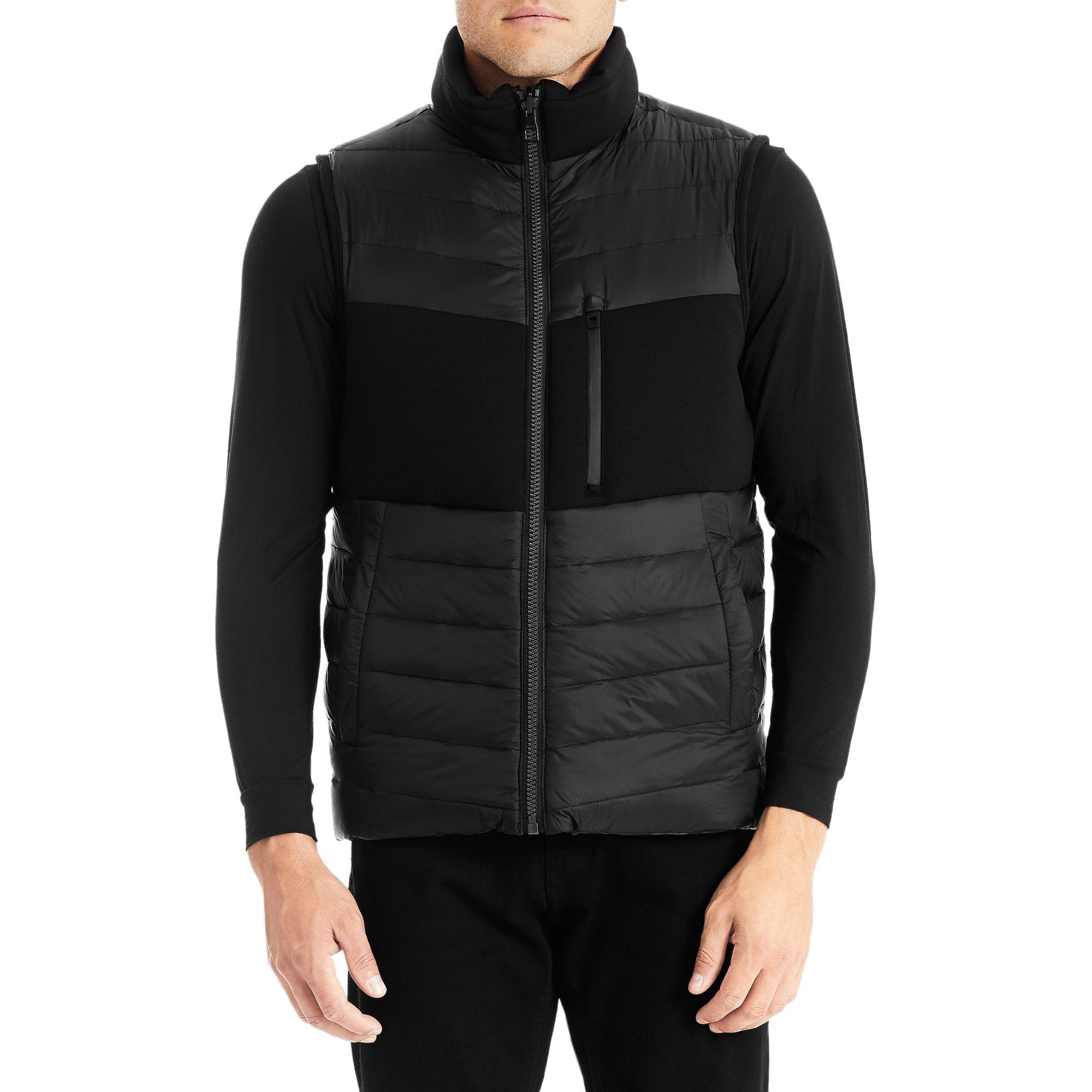 tumi puffer vest