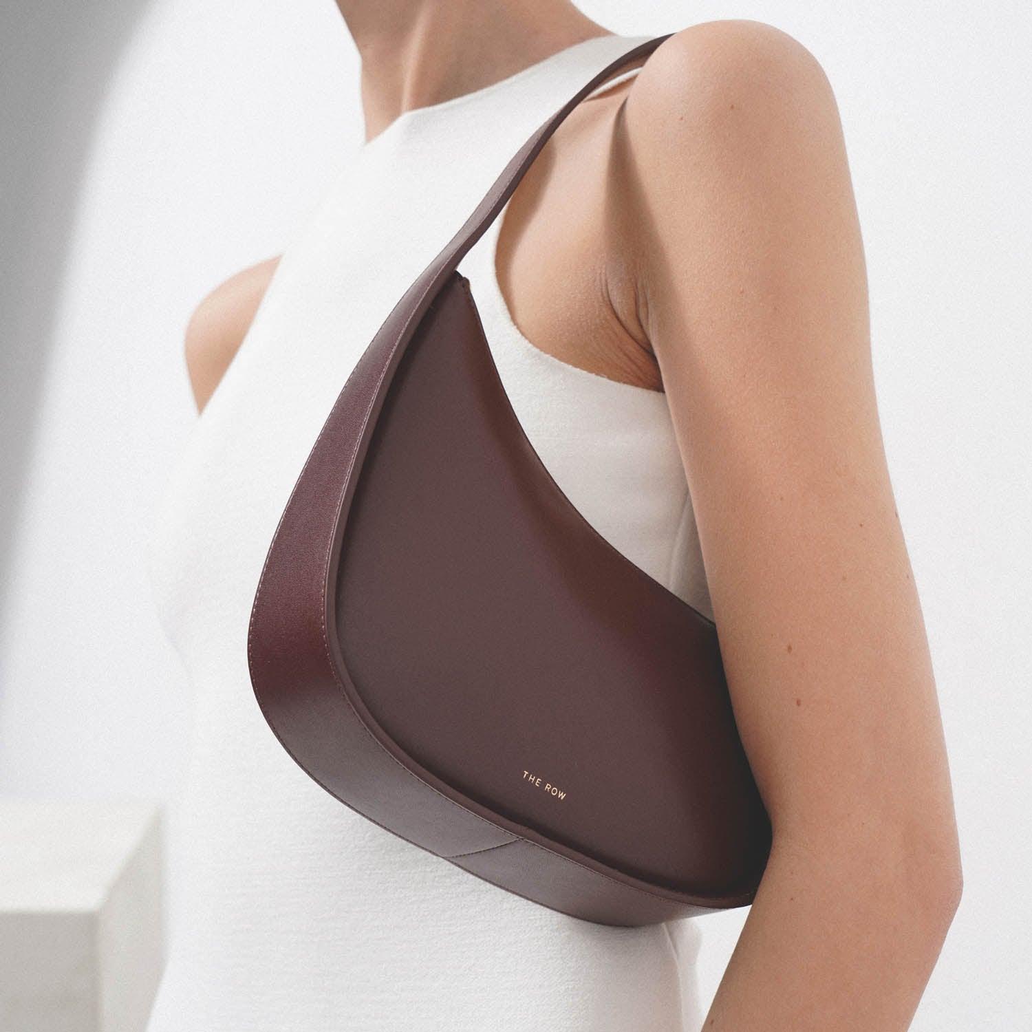The Row Half Moon Leather Shoulder Bag in Brown
