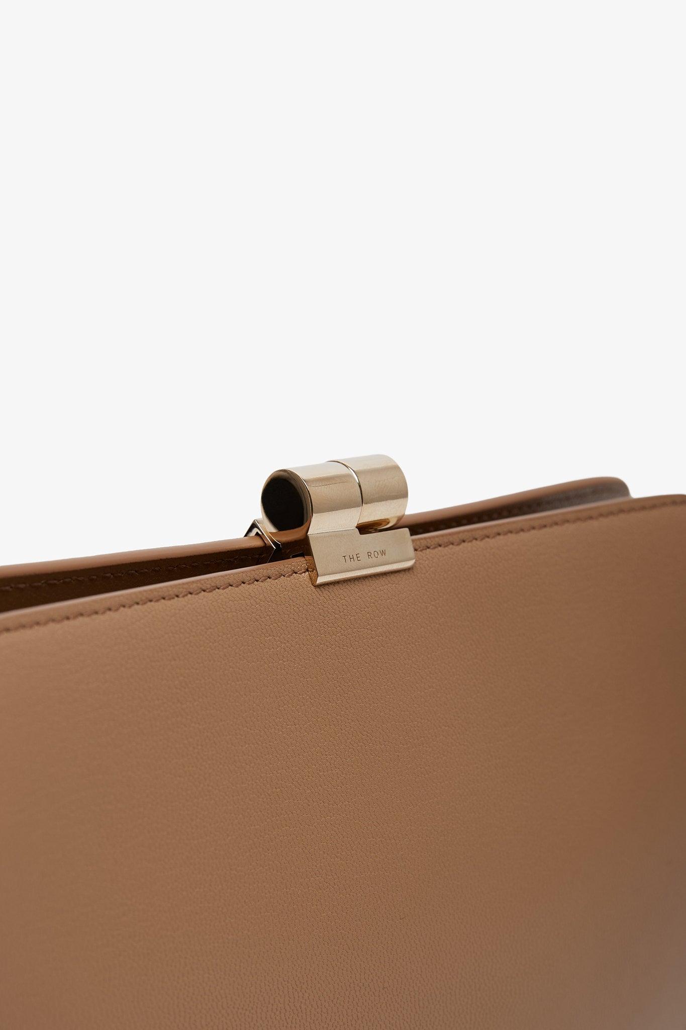 The Row Amazon Beige Shiny Leather Clutch in Brown | Lyst