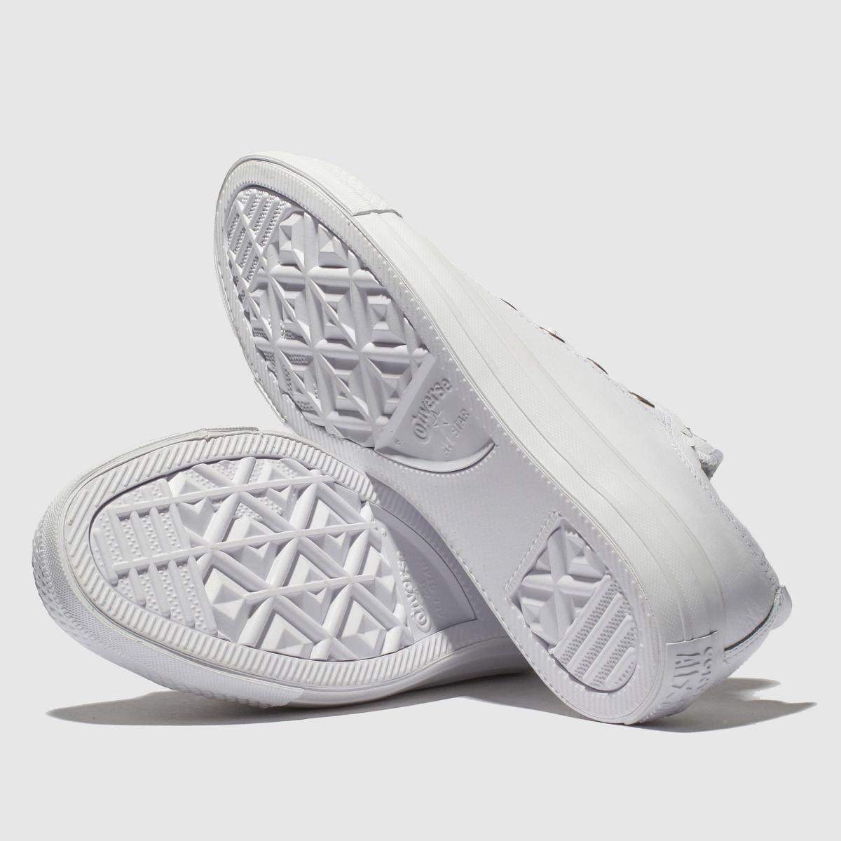white frilly converse