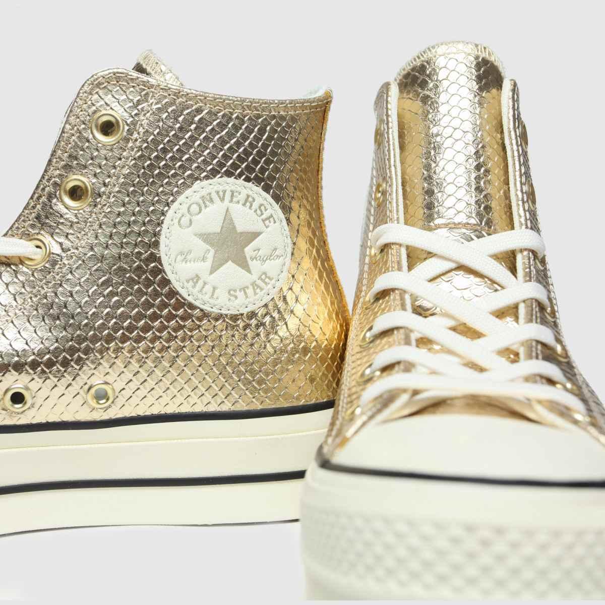 converse snake gold