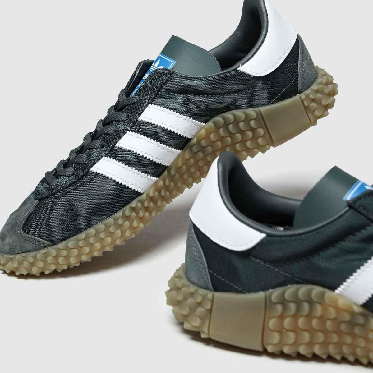 dark green adidas trainers