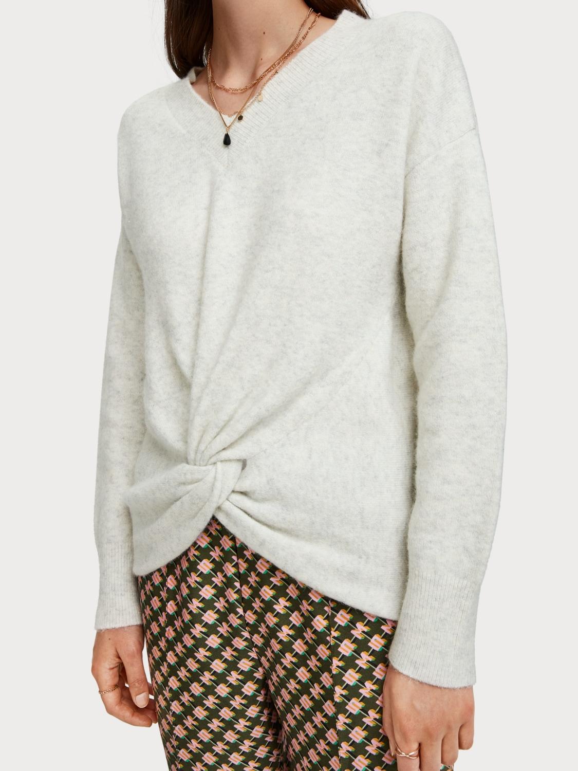 sweater with knot in front