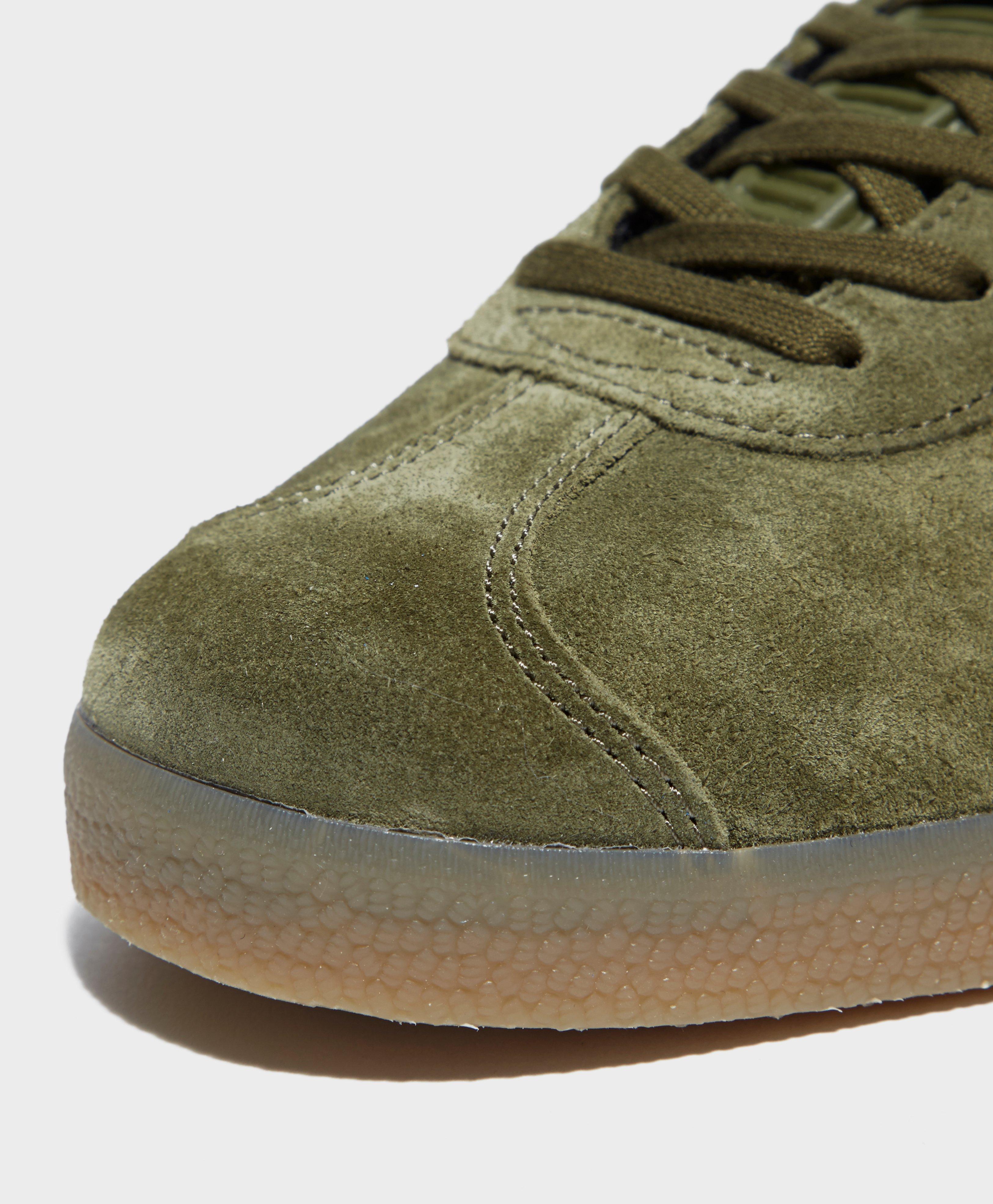 olive green and red shoes