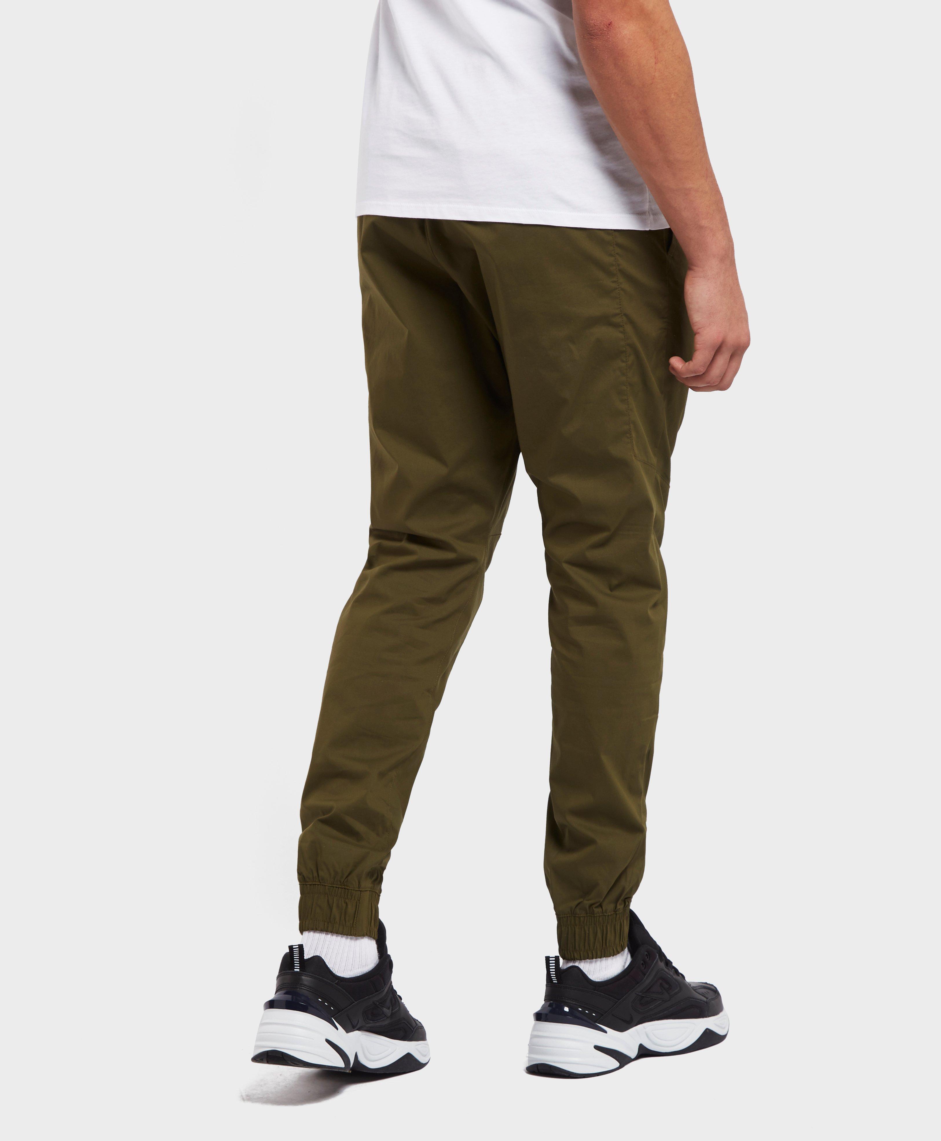 Nike Cotton Twill Cuffed Track Pants in Green for Men - Lyst