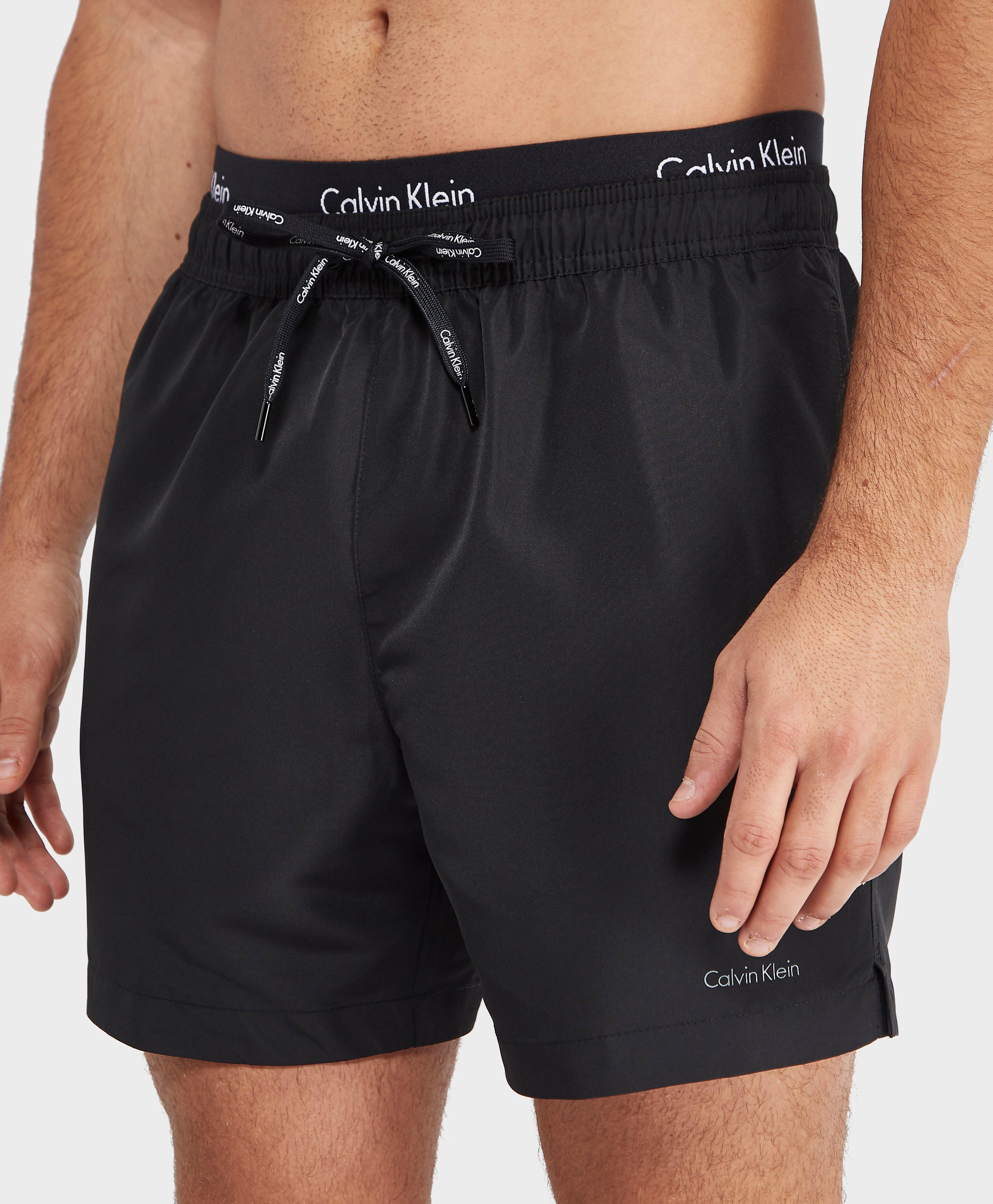 In de meeste gevallen Knop rivaal Calvin Klein Double Waistband Swim Shorts in Black for Men - Lyst