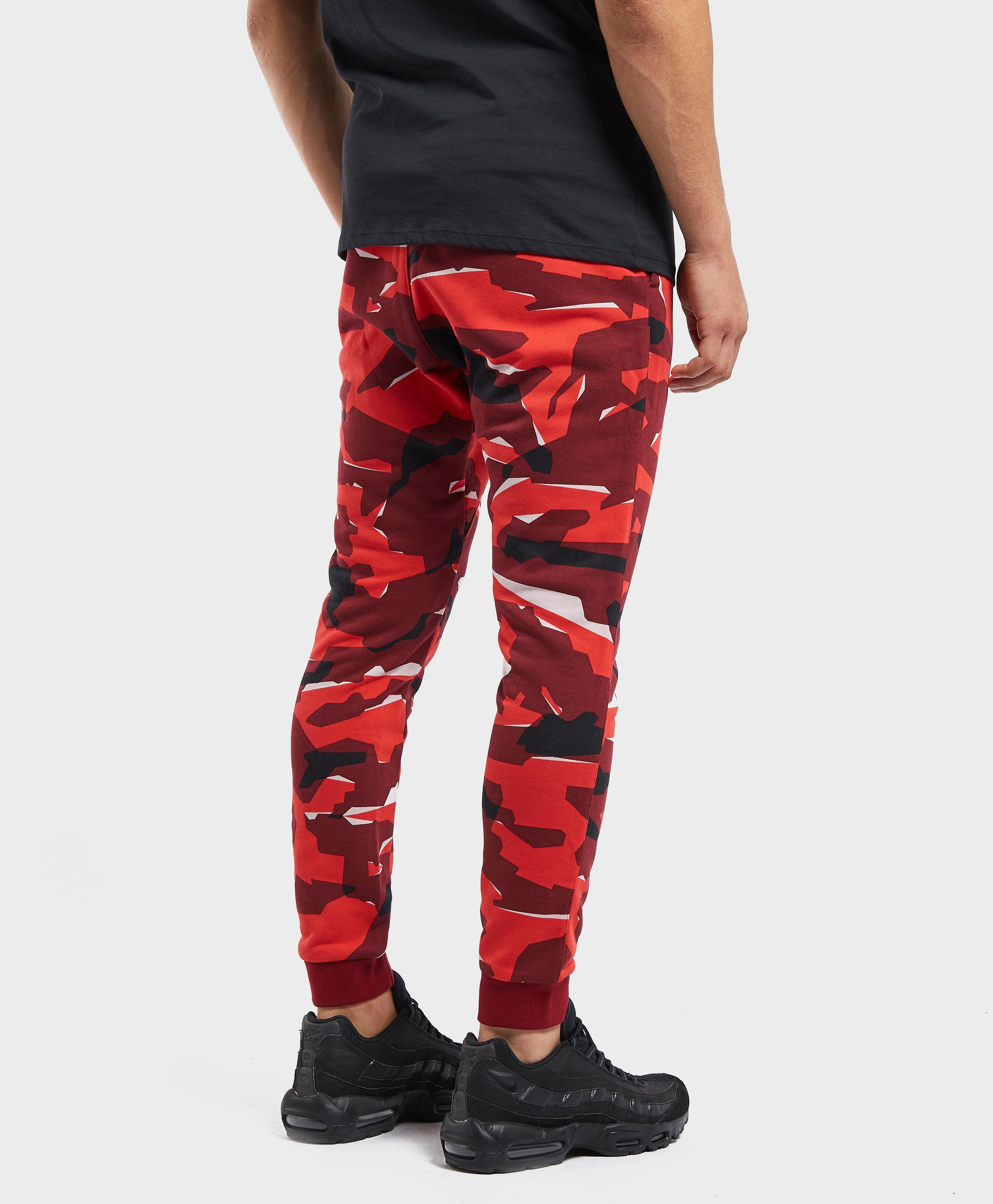 Nike Club Camo Cuffed Fleece Pants in Red for Men | Lyst