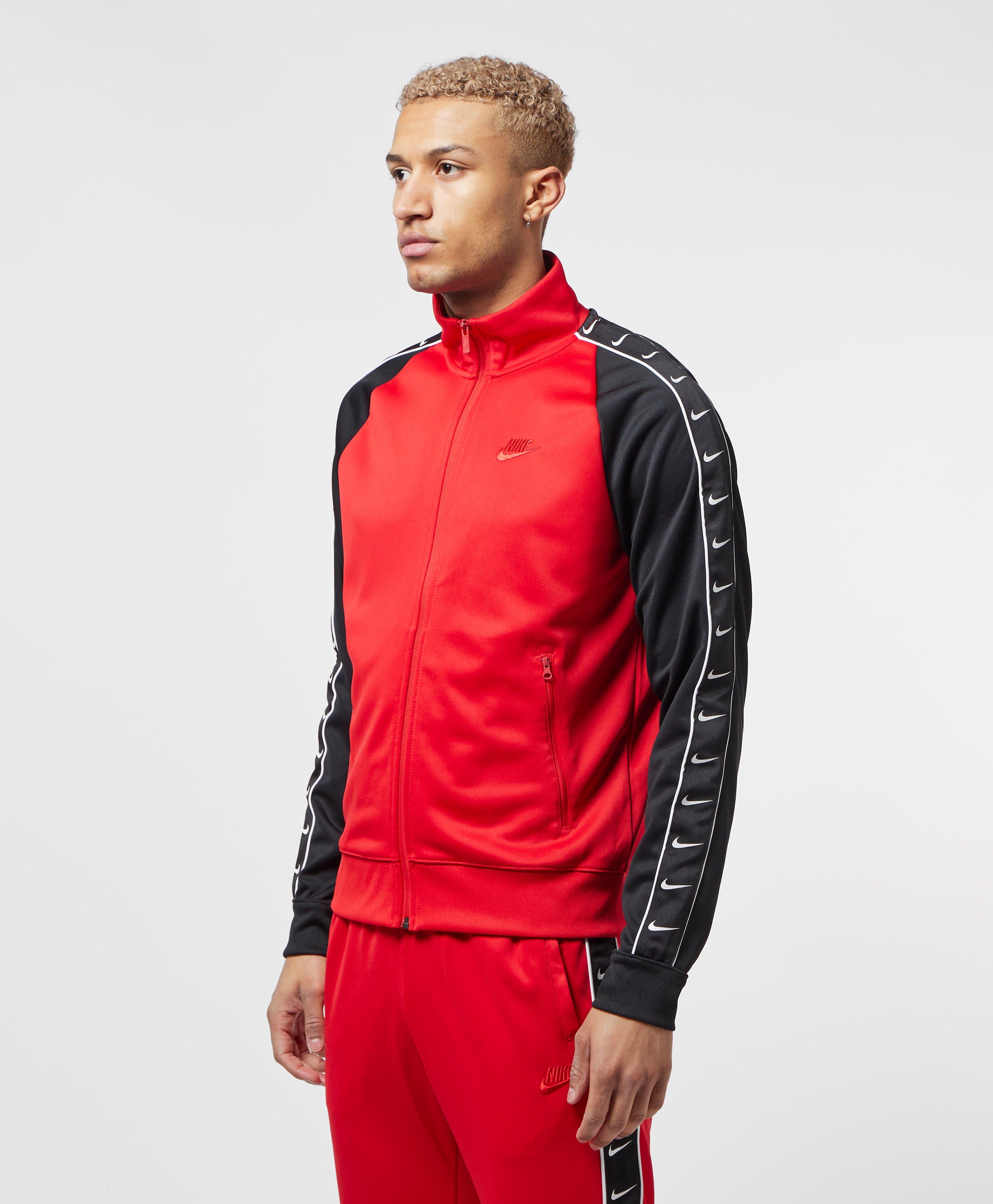 nike taped track top