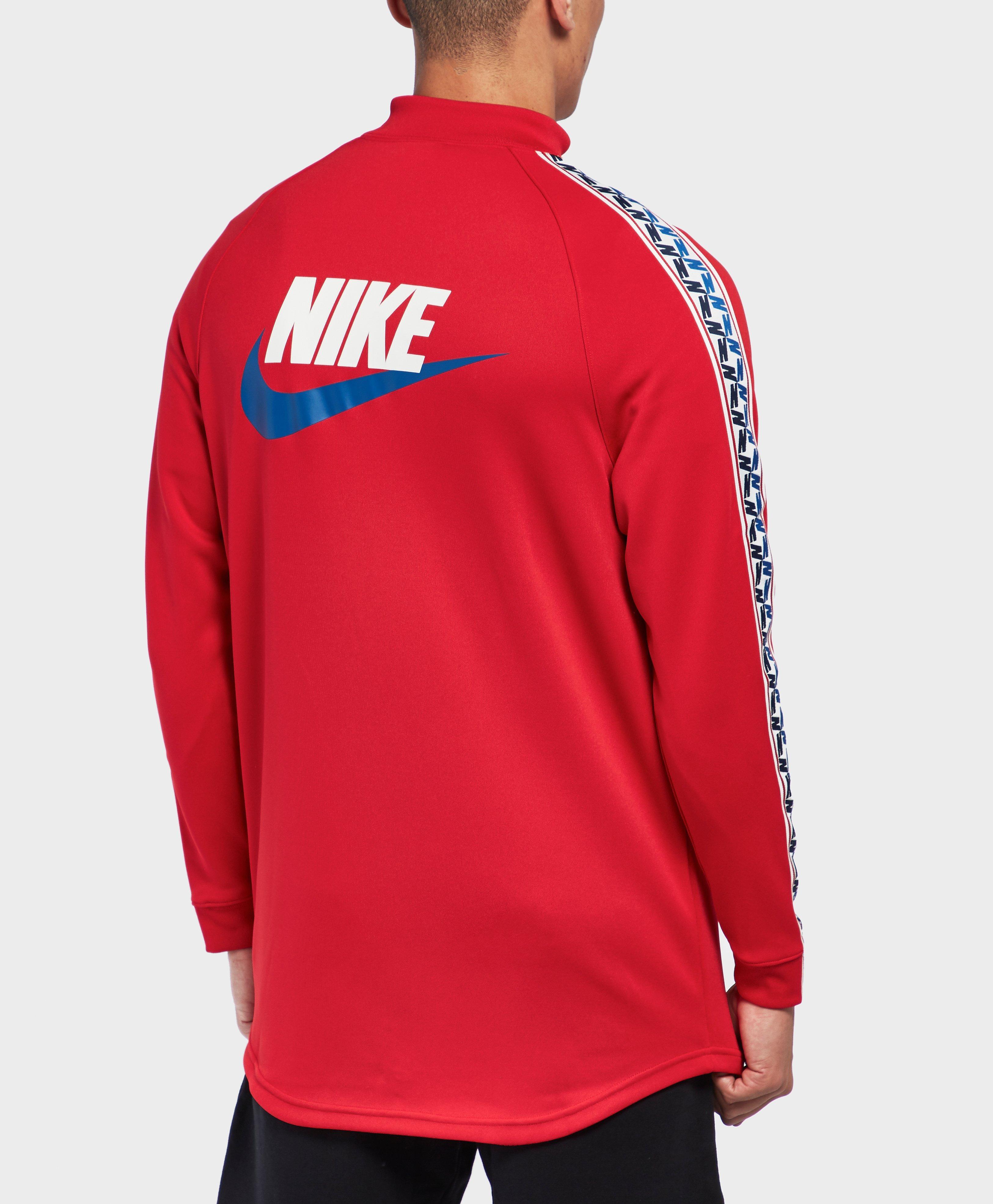 nike arch taped track top