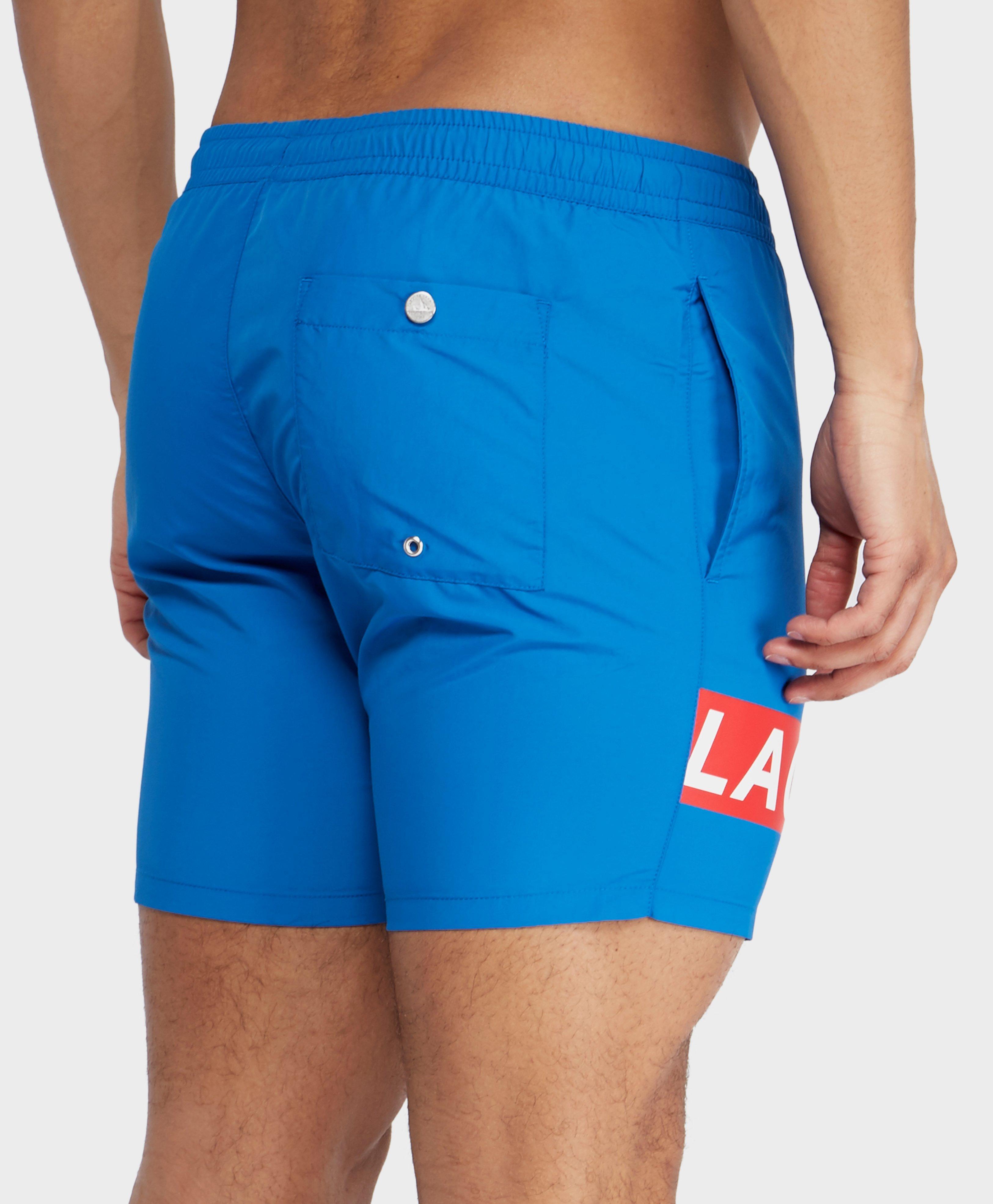 Lyst - Lacoste Branded Swim Shorts in Blue for Men