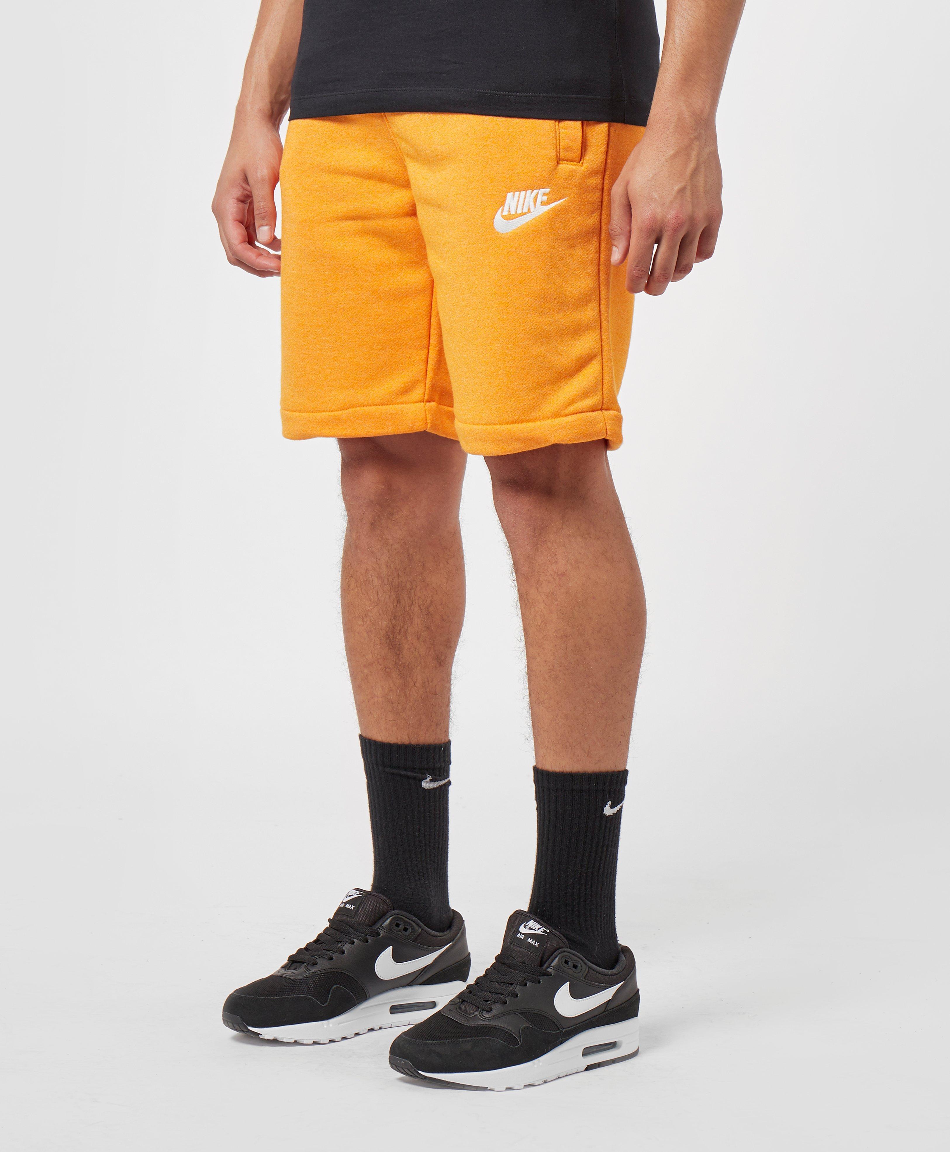 orange nike fleece shorts
