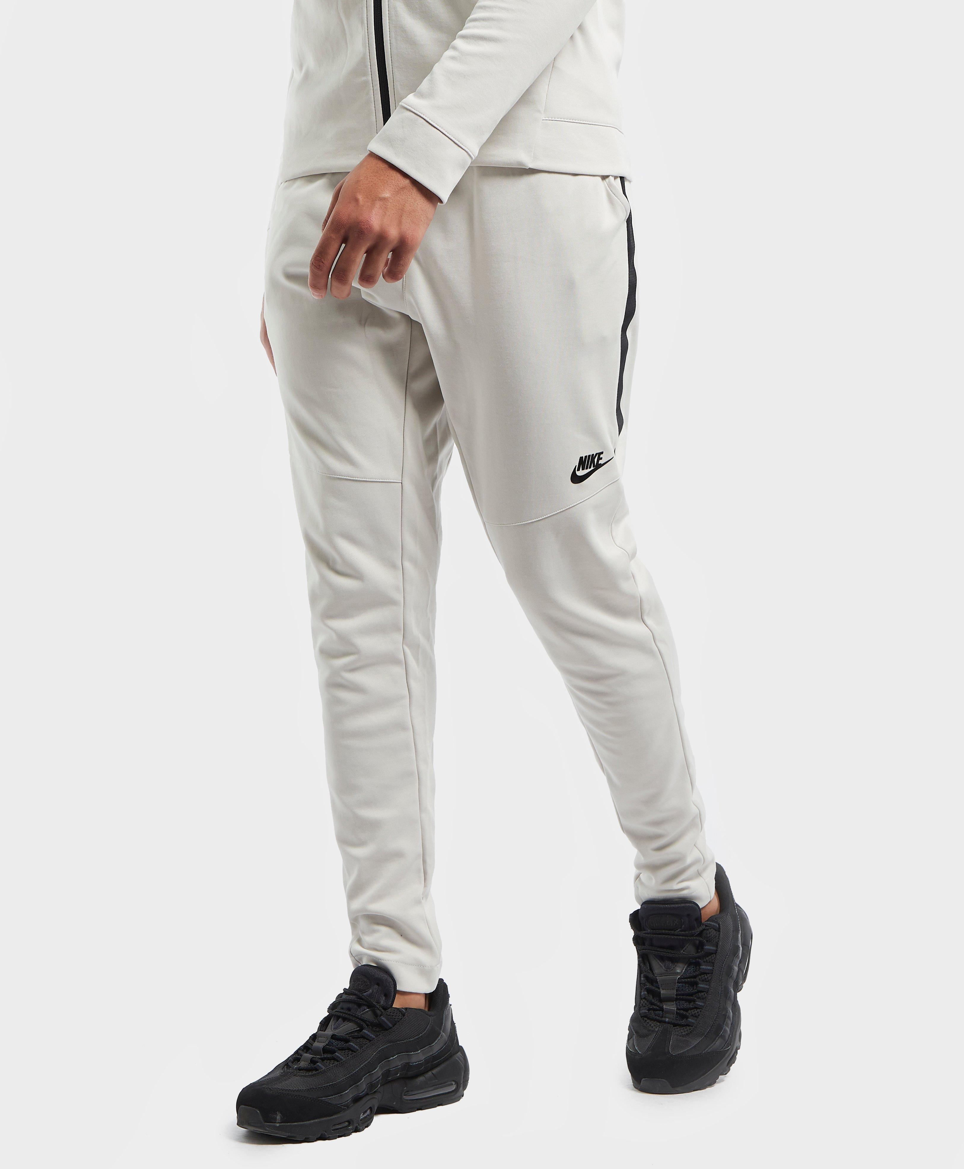 nike tribute poly track pants