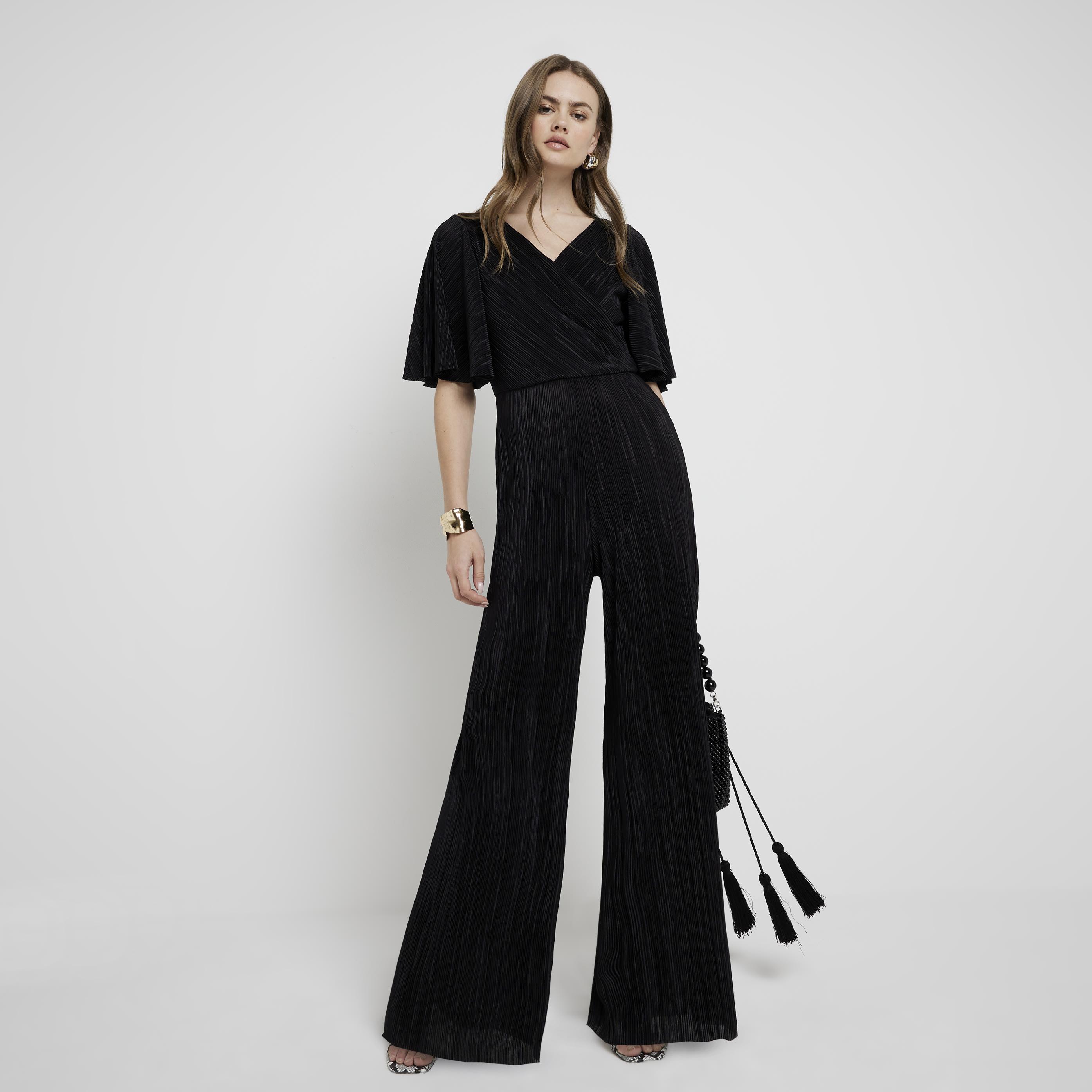 River Island Black Plisse Wrap Jumpsuit Lyst UK