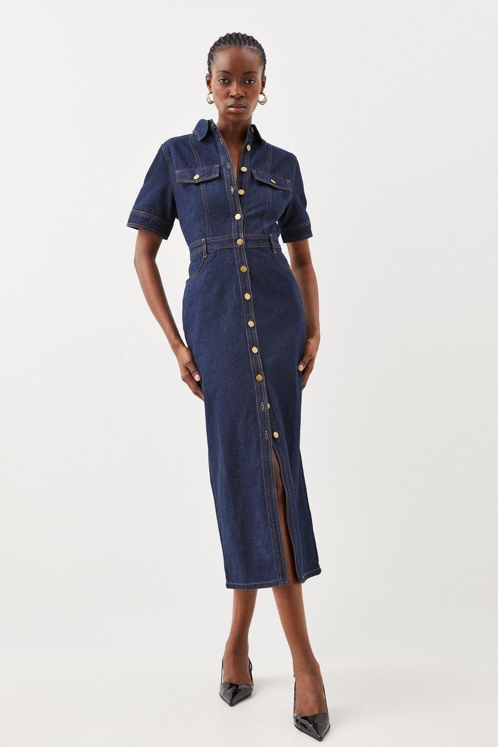 karen millen denim dress Button Front Sleeved Shirt in Mid Blue through front design Structured chest pockets with contrast stitching detail Long sleeves with buttoned cuffs for versatile styling Practical side pockets for everyday functionality Elegant midi length with subtle front slit for ease of movement The Karen Millen Denim Shirt Dress combines timeless sophistication with contemporary design Karen Millen Petite Denim Maxi