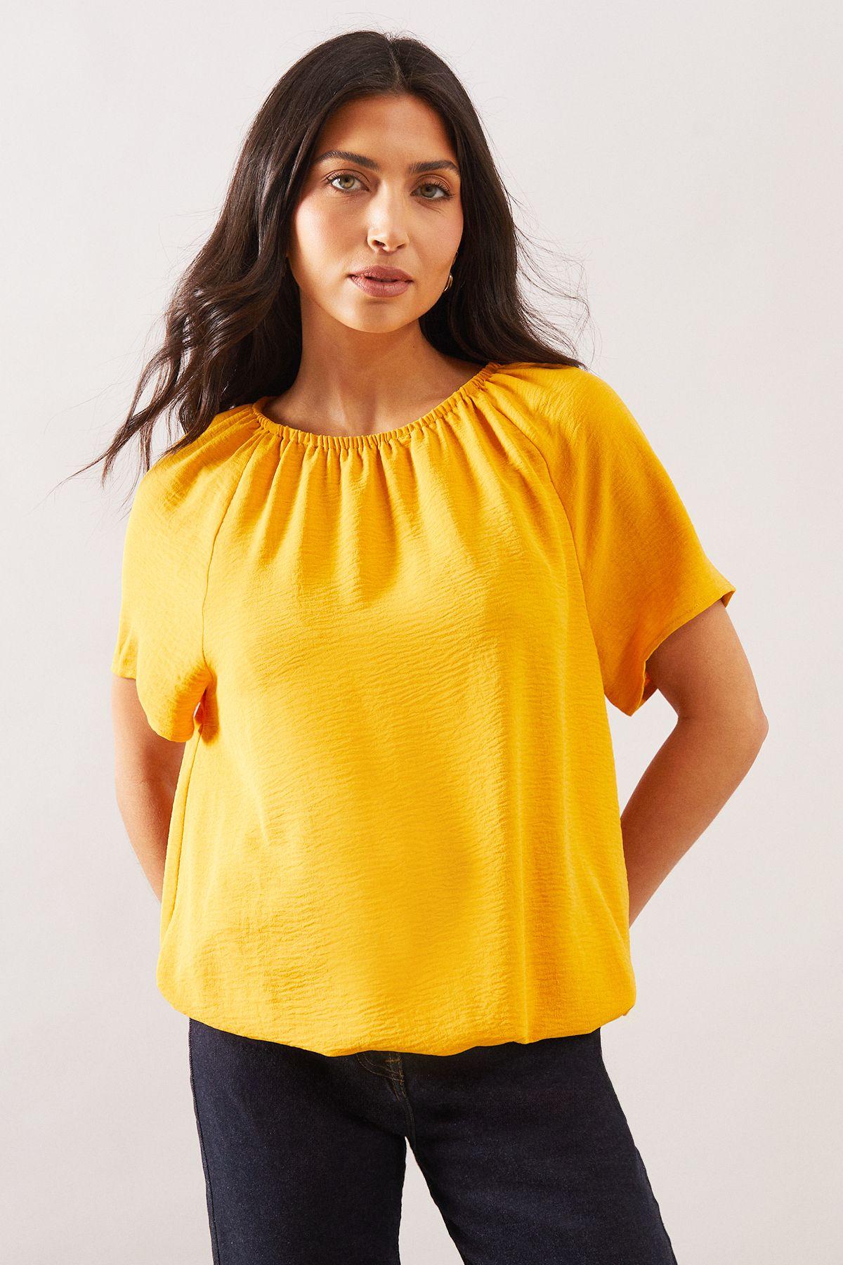 wallis yellow tops