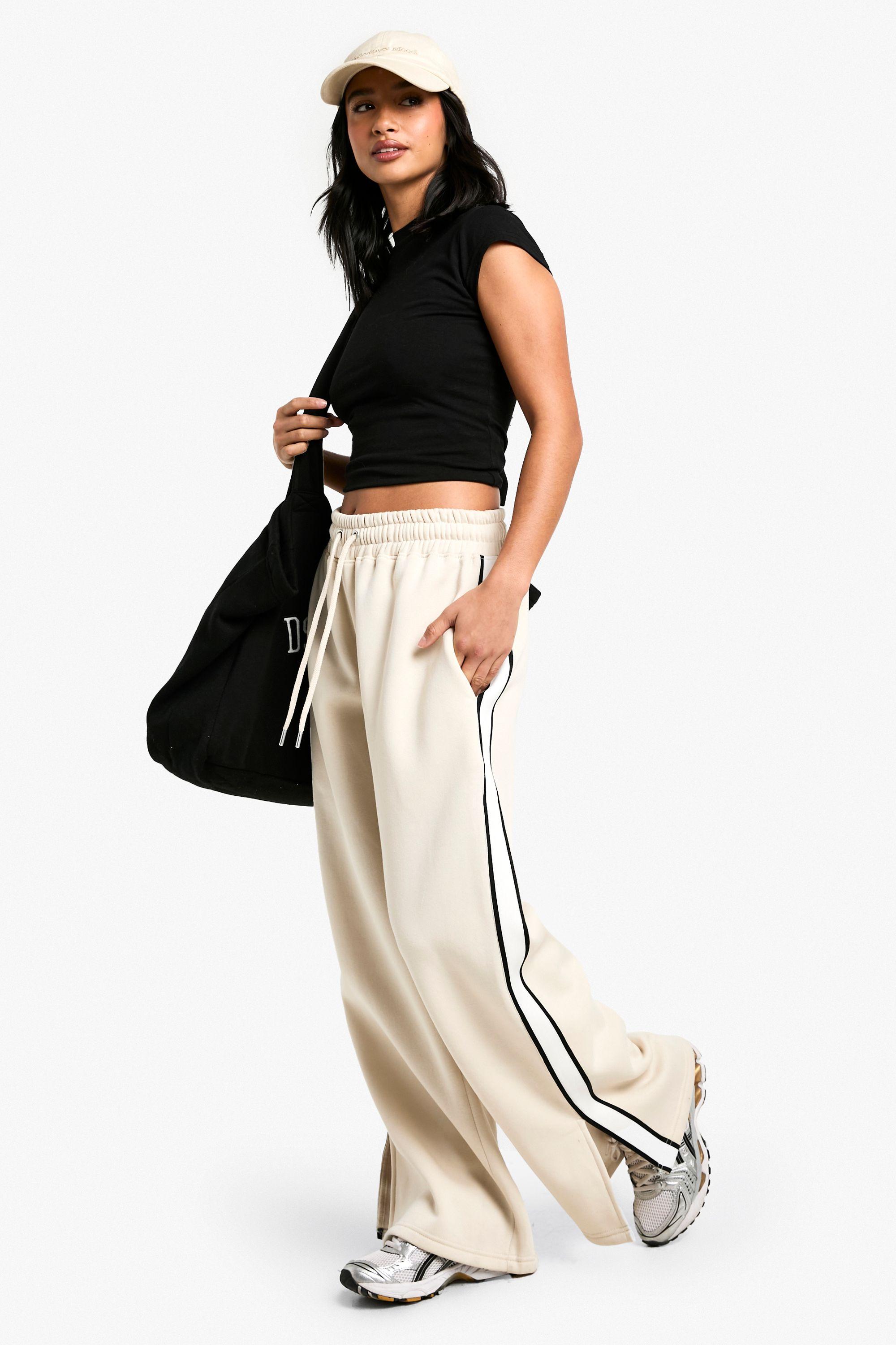Boohoo Petite Side Stripe Tape Split Hem Wide Leg Joggers in Black