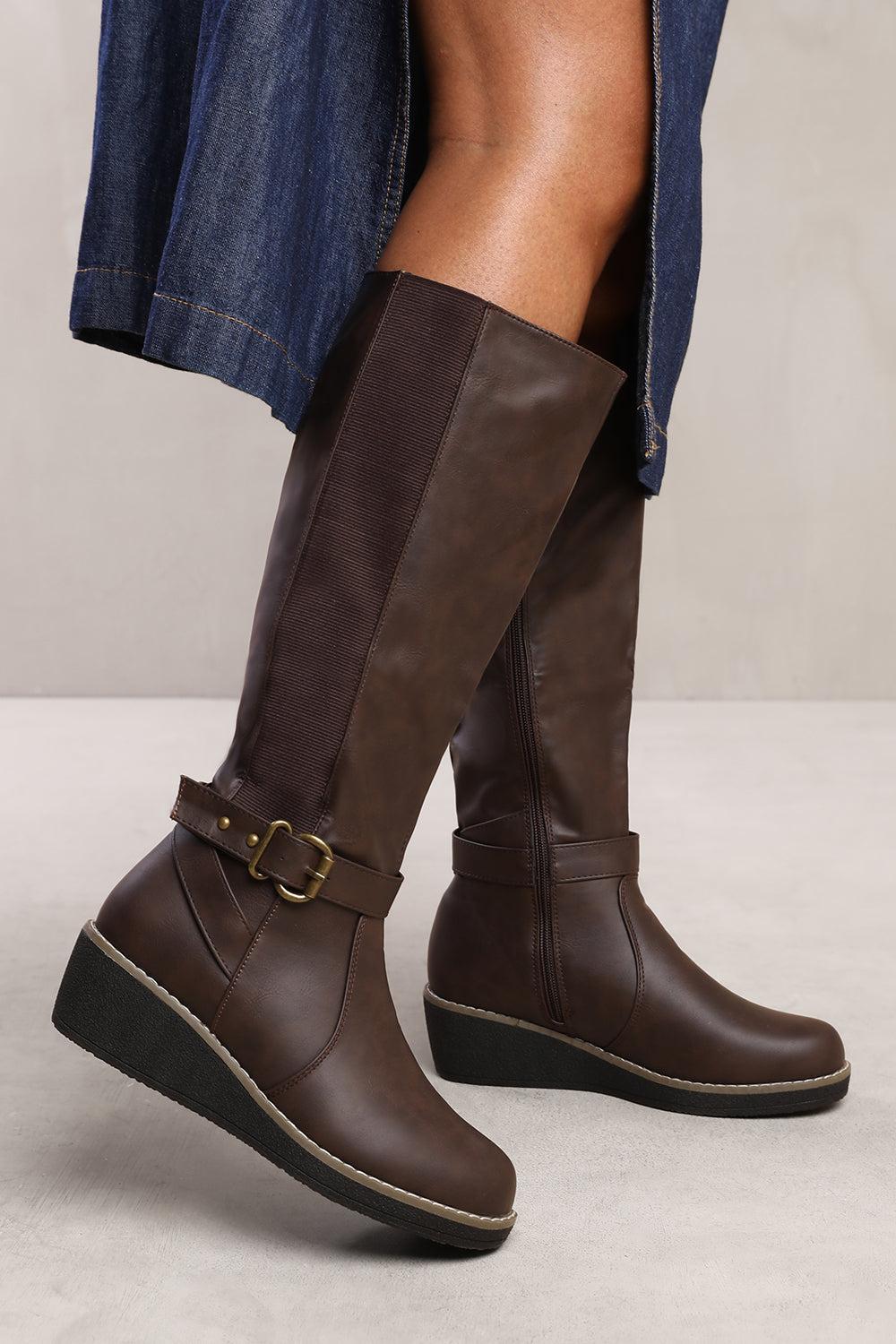 Knee high boots with elastic panel hotsell