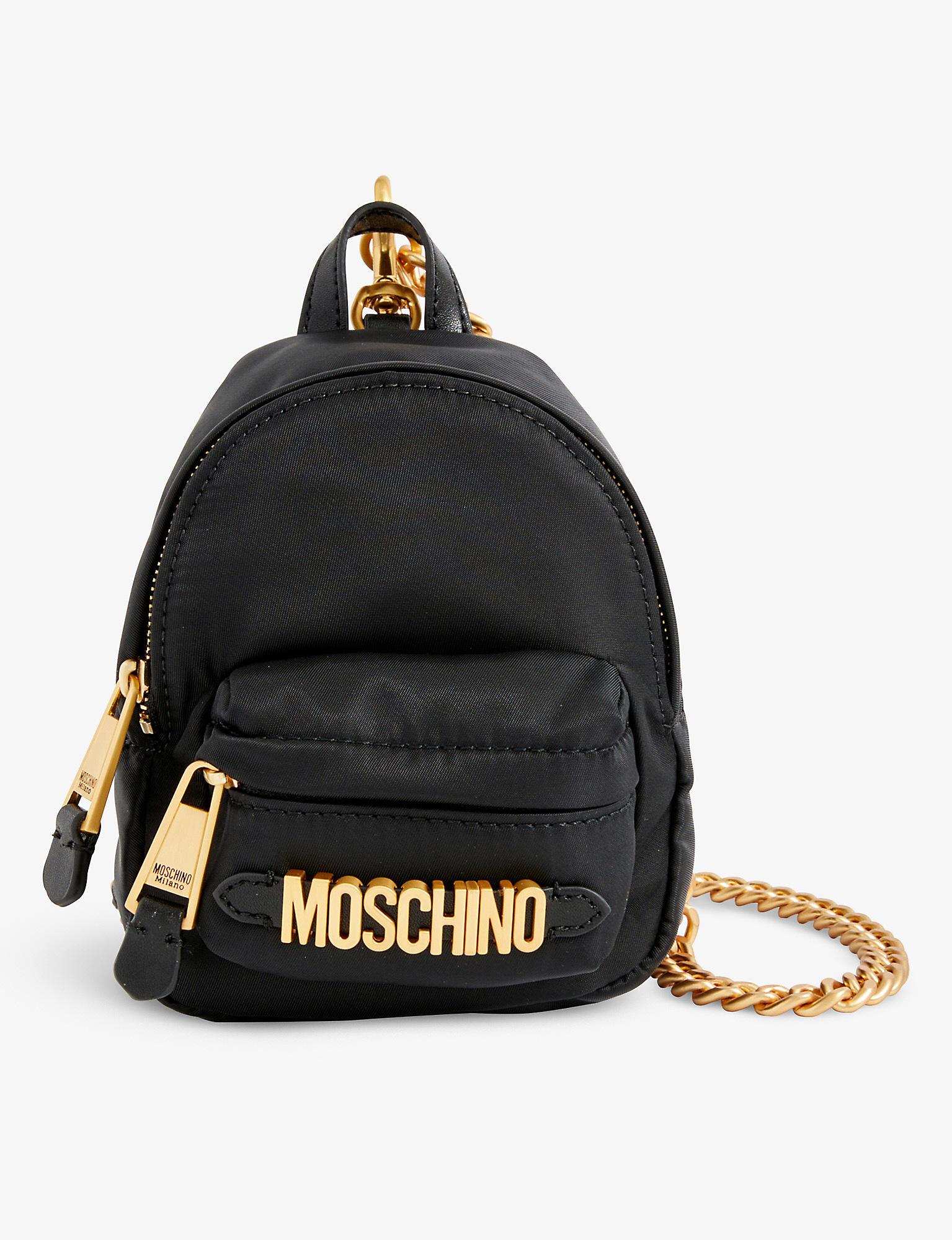 Moschino Logo-plaque Shell Mini Backpack in Black | Lyst