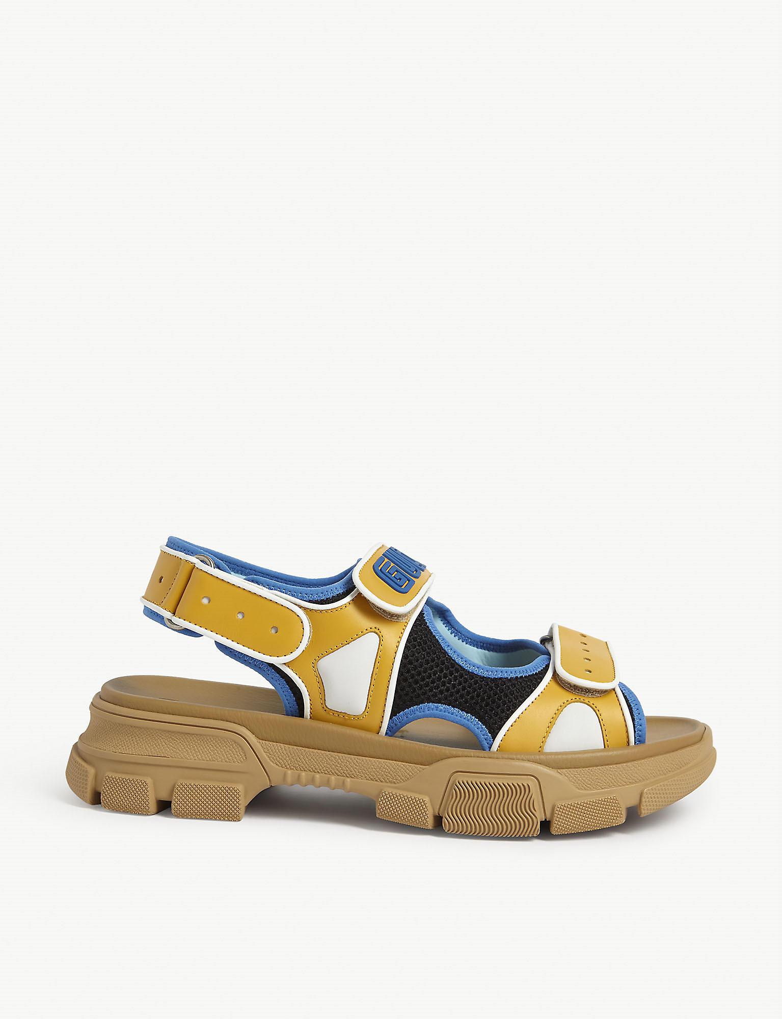 Gucci Aguru Trek Brand-embellished Leather Gladiator Sandals in 