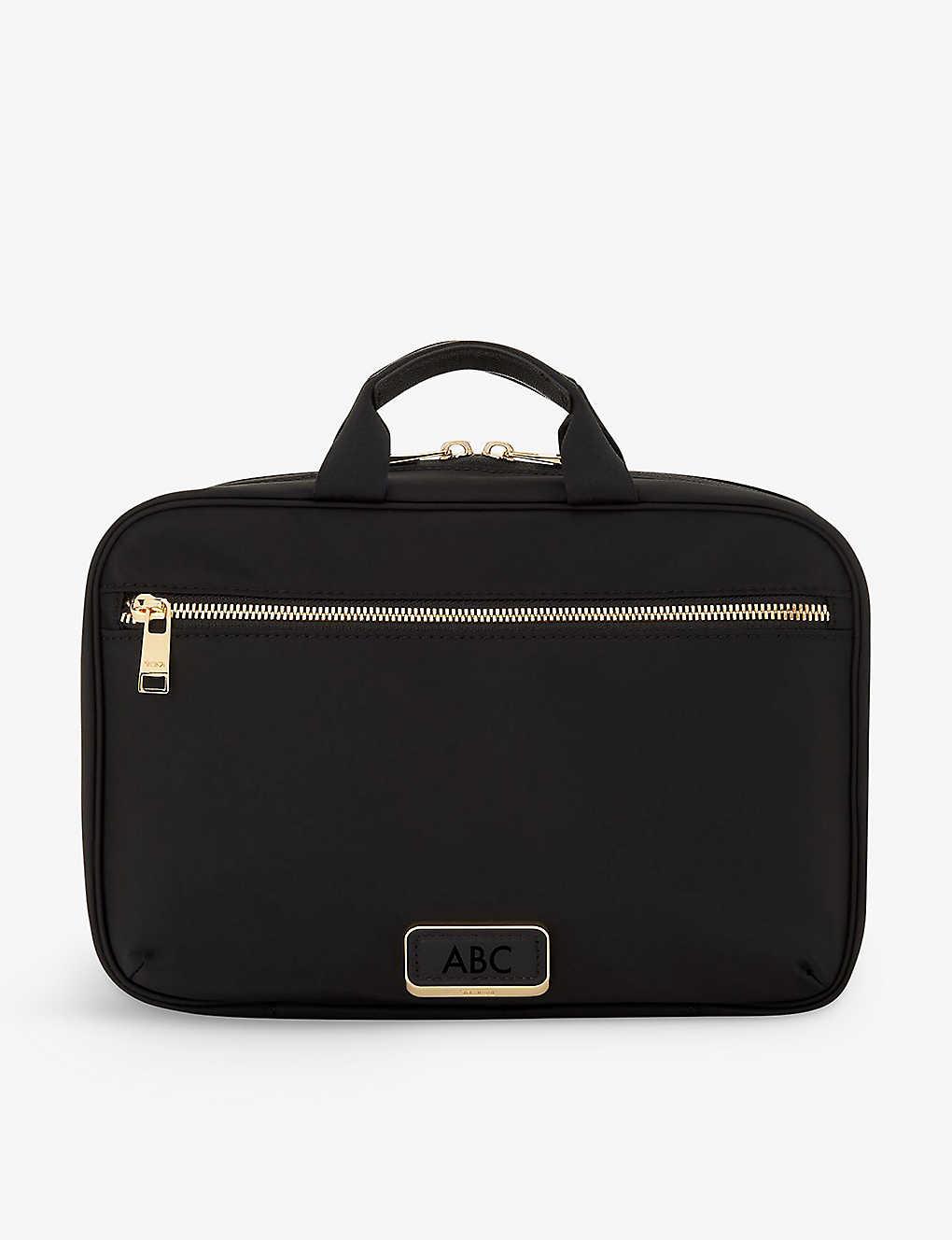 Tumi Madeline Frontpocket Zipup Nylon Cosmetic Case in Black Lyst