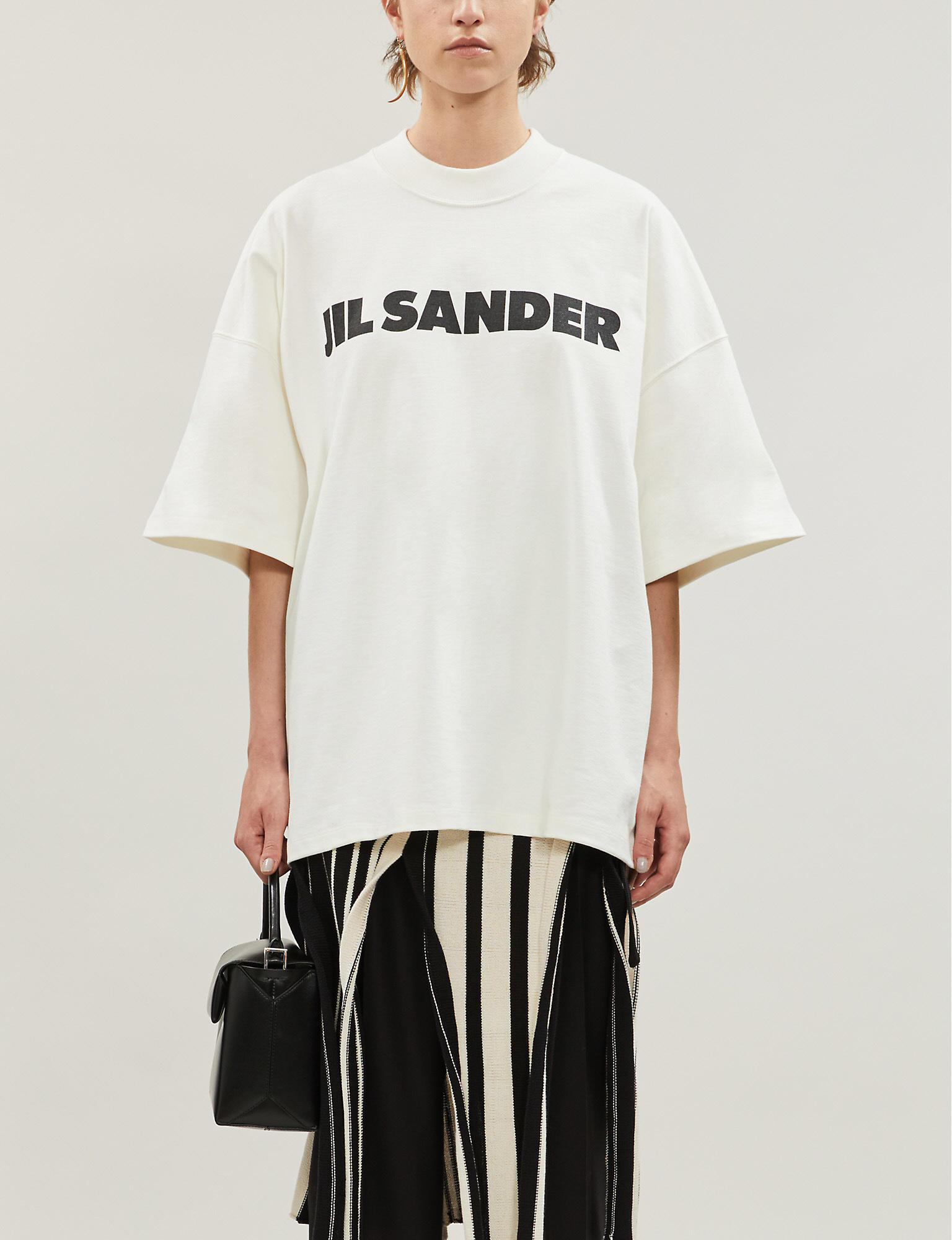 Donna T-shirt e top da T-shirt e top Jil Sander T-shirt con maniche a spalla bassaJil Sander in Cotone di colore Bianco 
