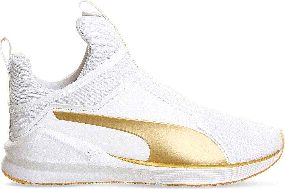white and gold high top pumas
