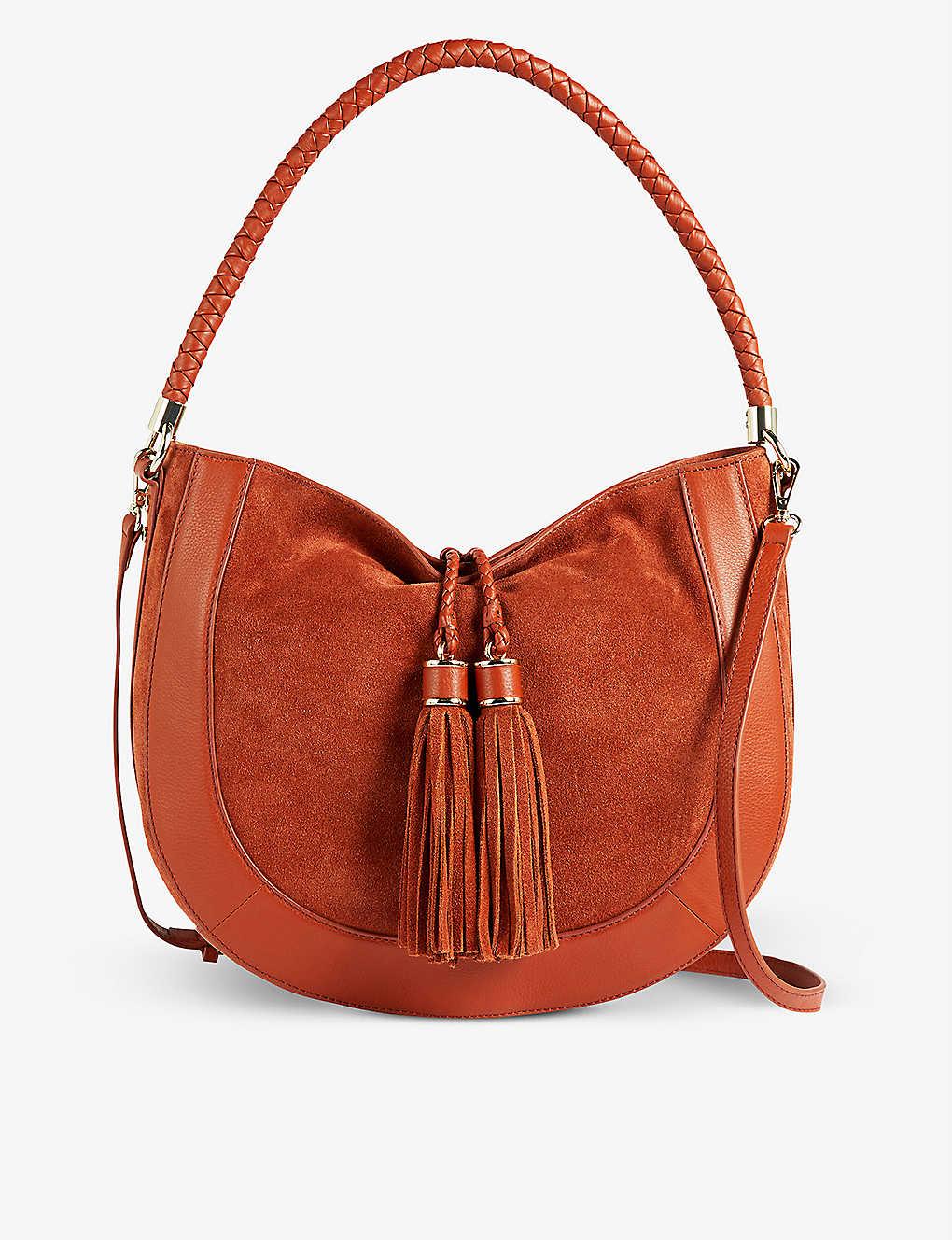Braided leather shoulder bag with braided handles