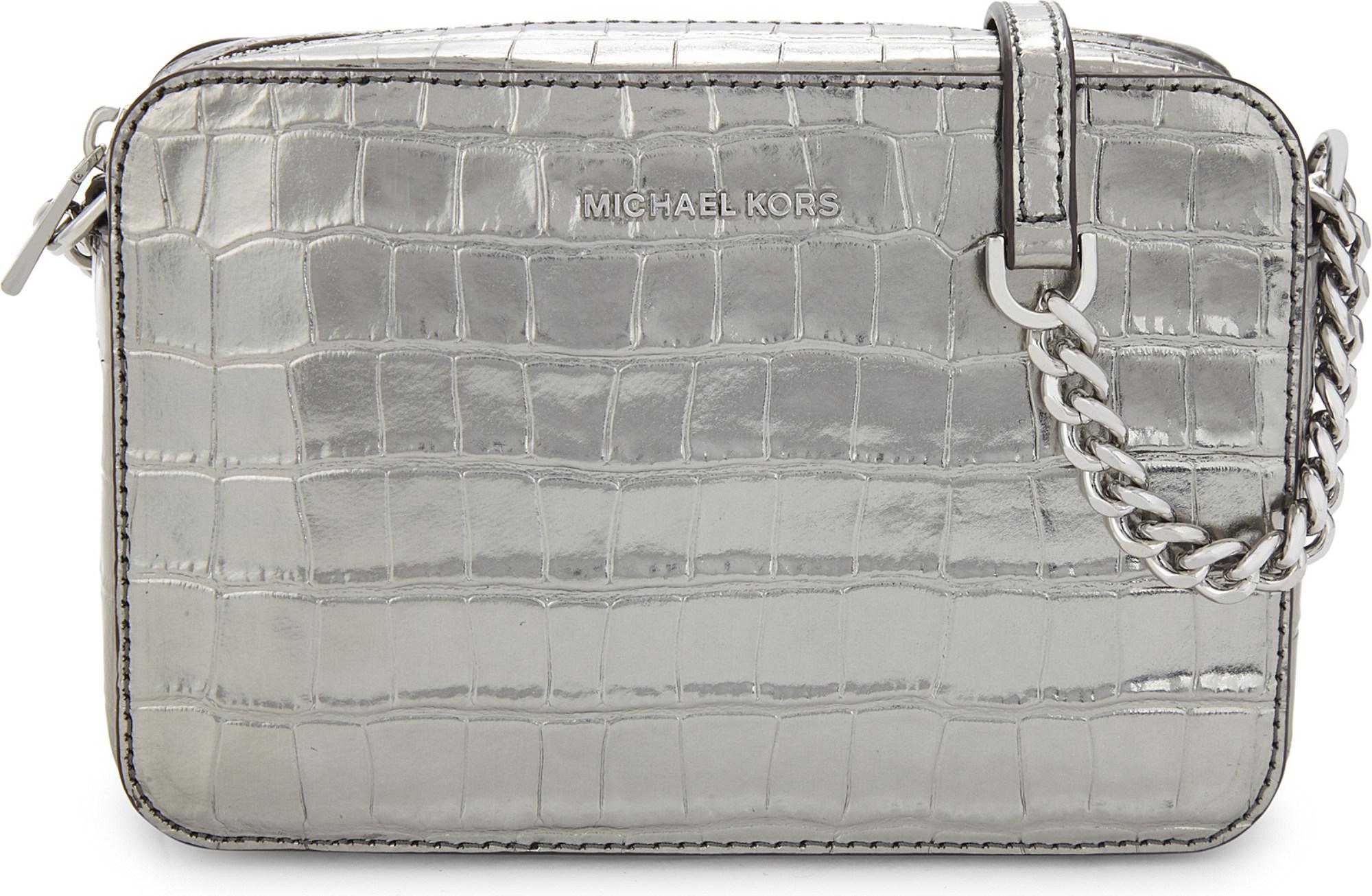 Michael Kors white and silver metallic floral crossbody purse | Purses  crossbody, Metallic silver, Purses