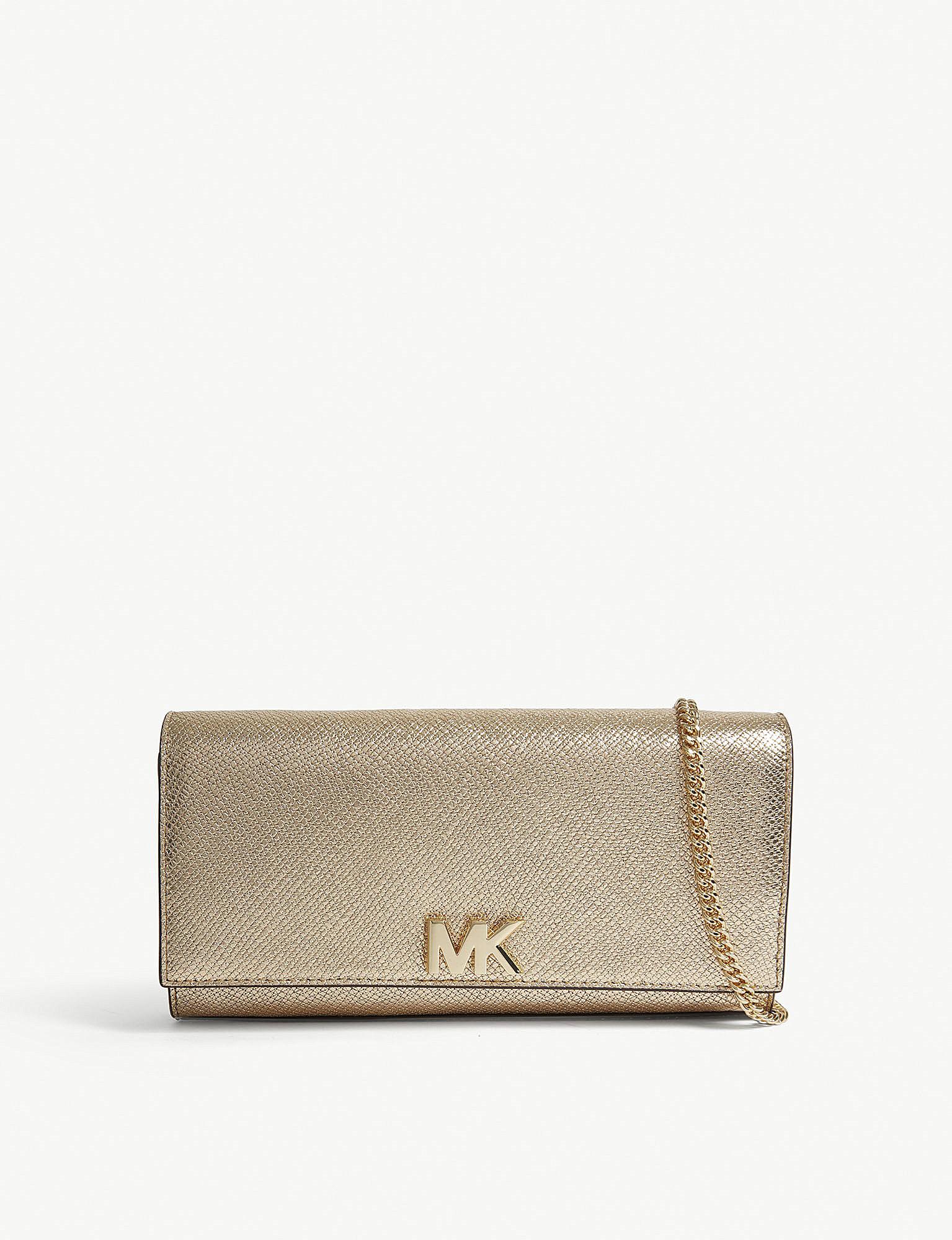 mk gold clutch